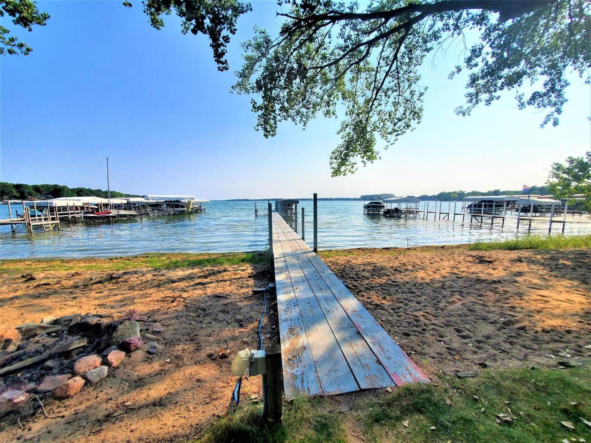 Classic West Lake Okoboji Estate w/ Guest House + Sand Beach