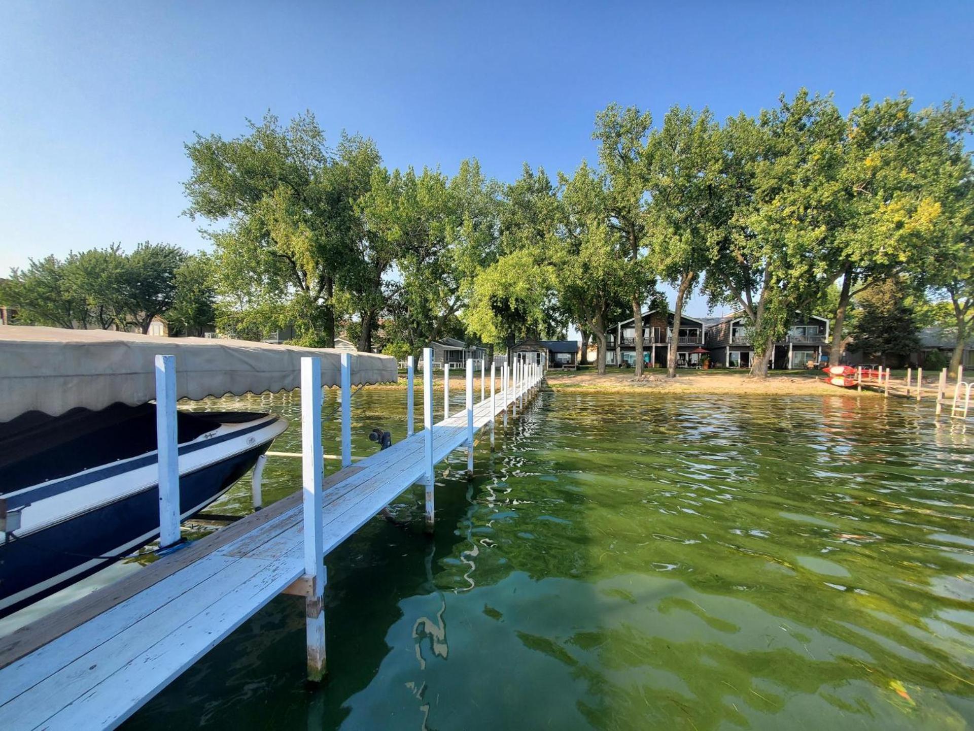 Classic West Lake Okoboji Estate w/ Guest House + Sand Beach