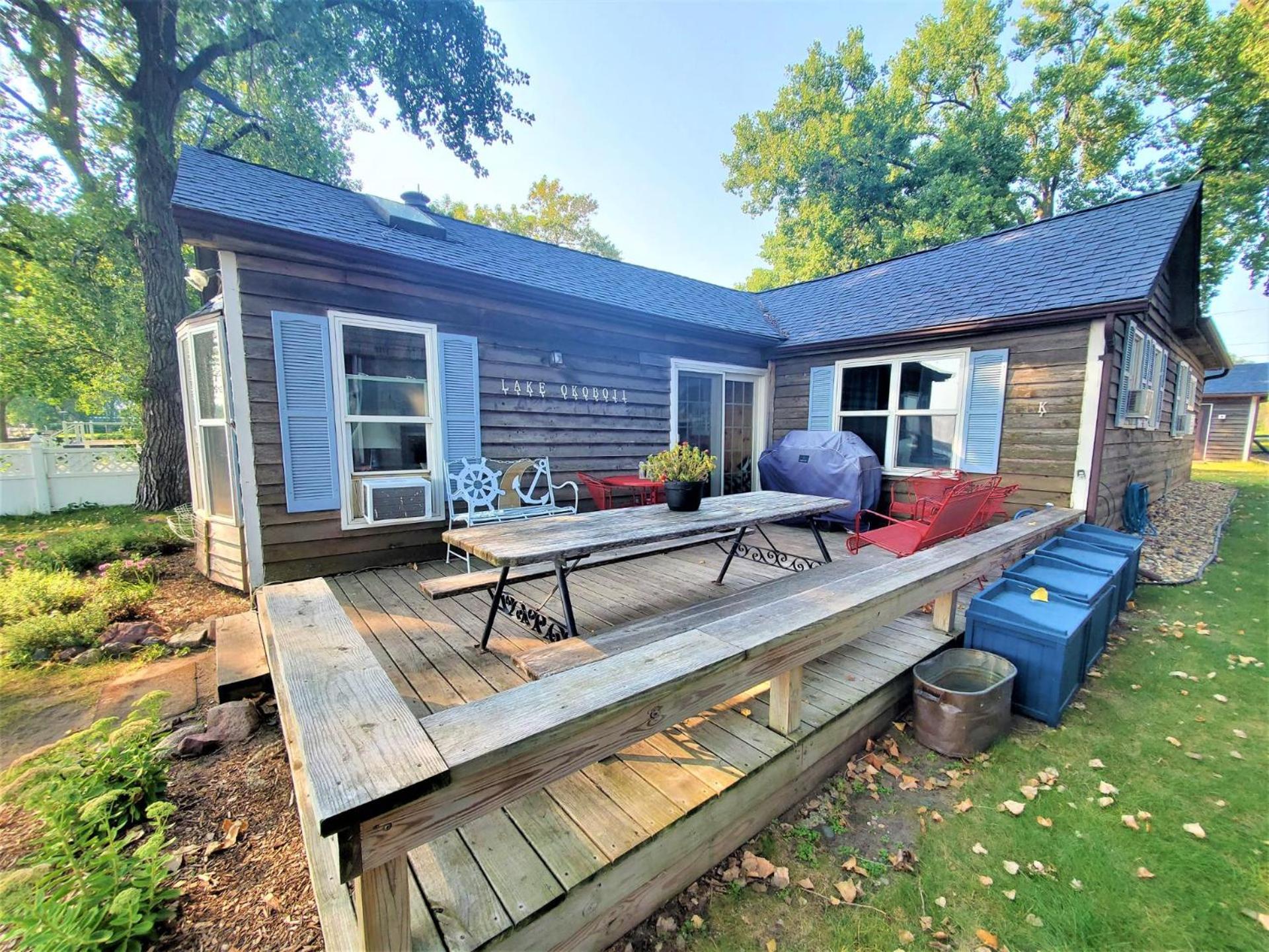 Classic West Lake Okoboji Estate w/ Guest House + Sand Beach
