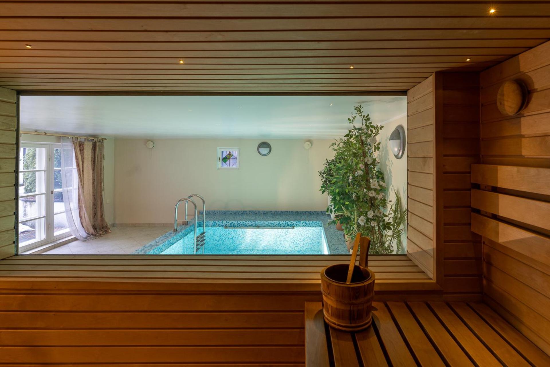 Villa Muusa with a cozy sauna, swimming pool and large beautiful garden