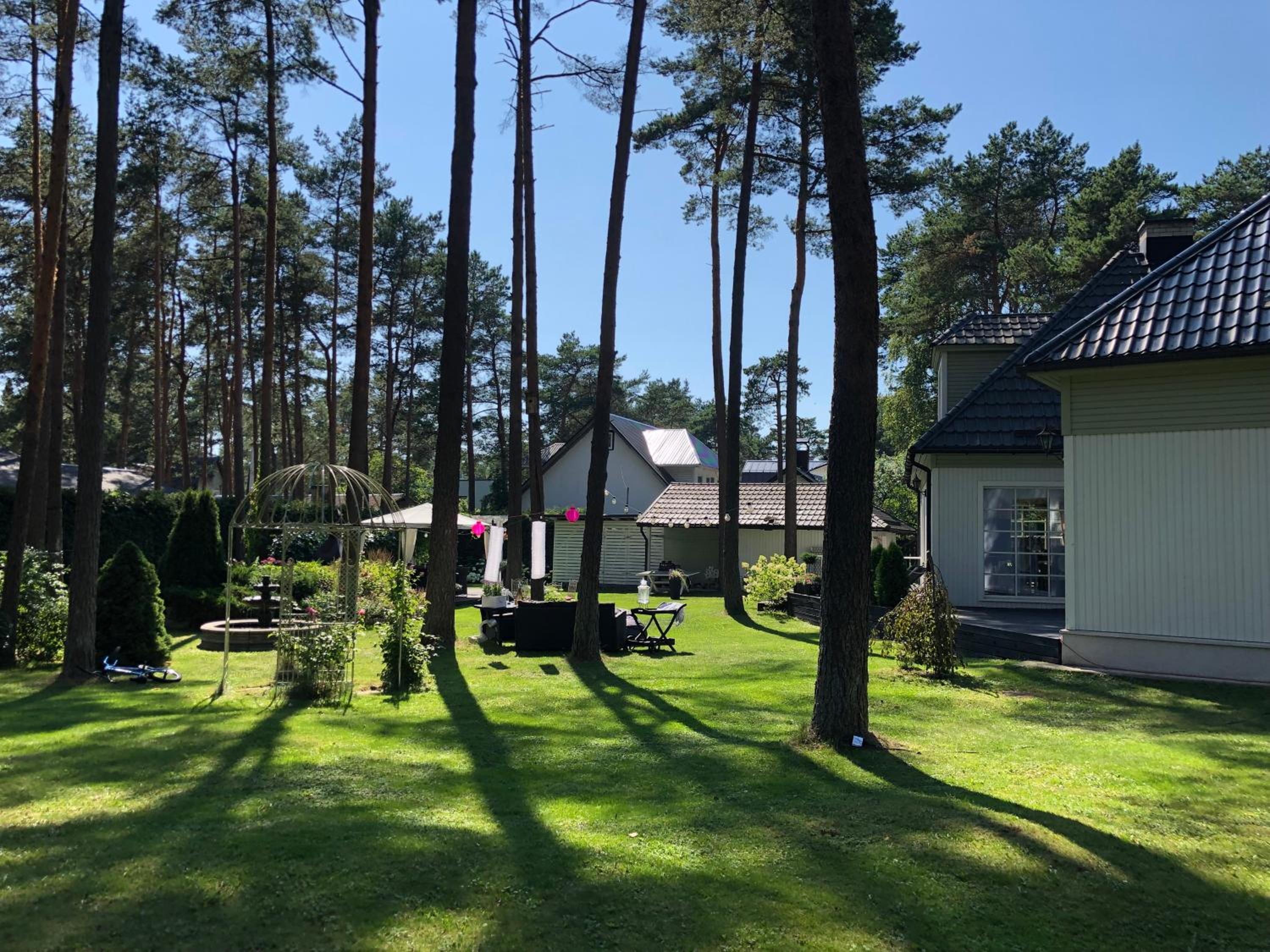 Villa Muusa with a cozy sauna, swimming pool and large beautiful garden