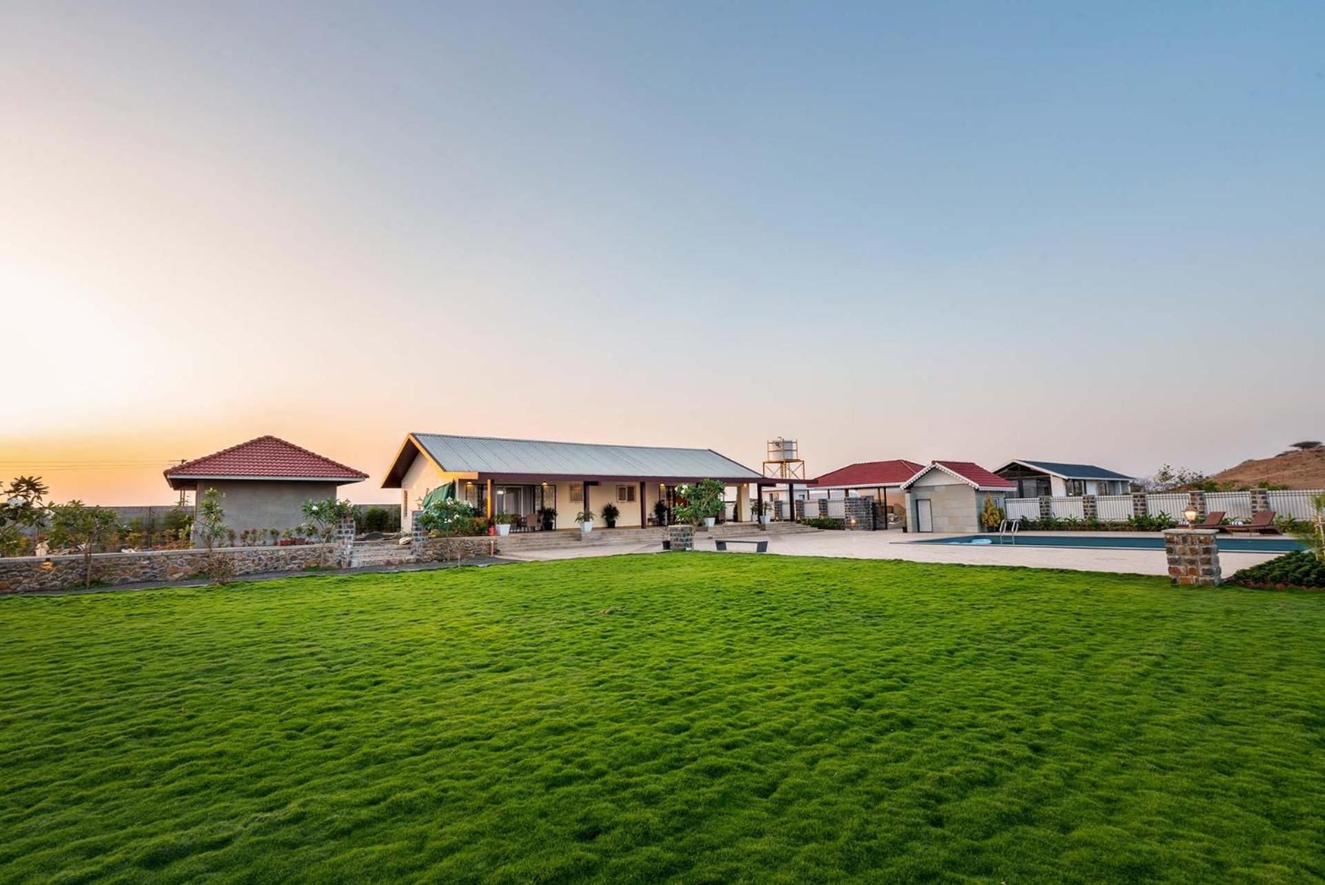 Breezy Whispers by StayVista - Private infinity pool, Stunning mountain views, Spacious swimming pool, Deck & Lawn view 3