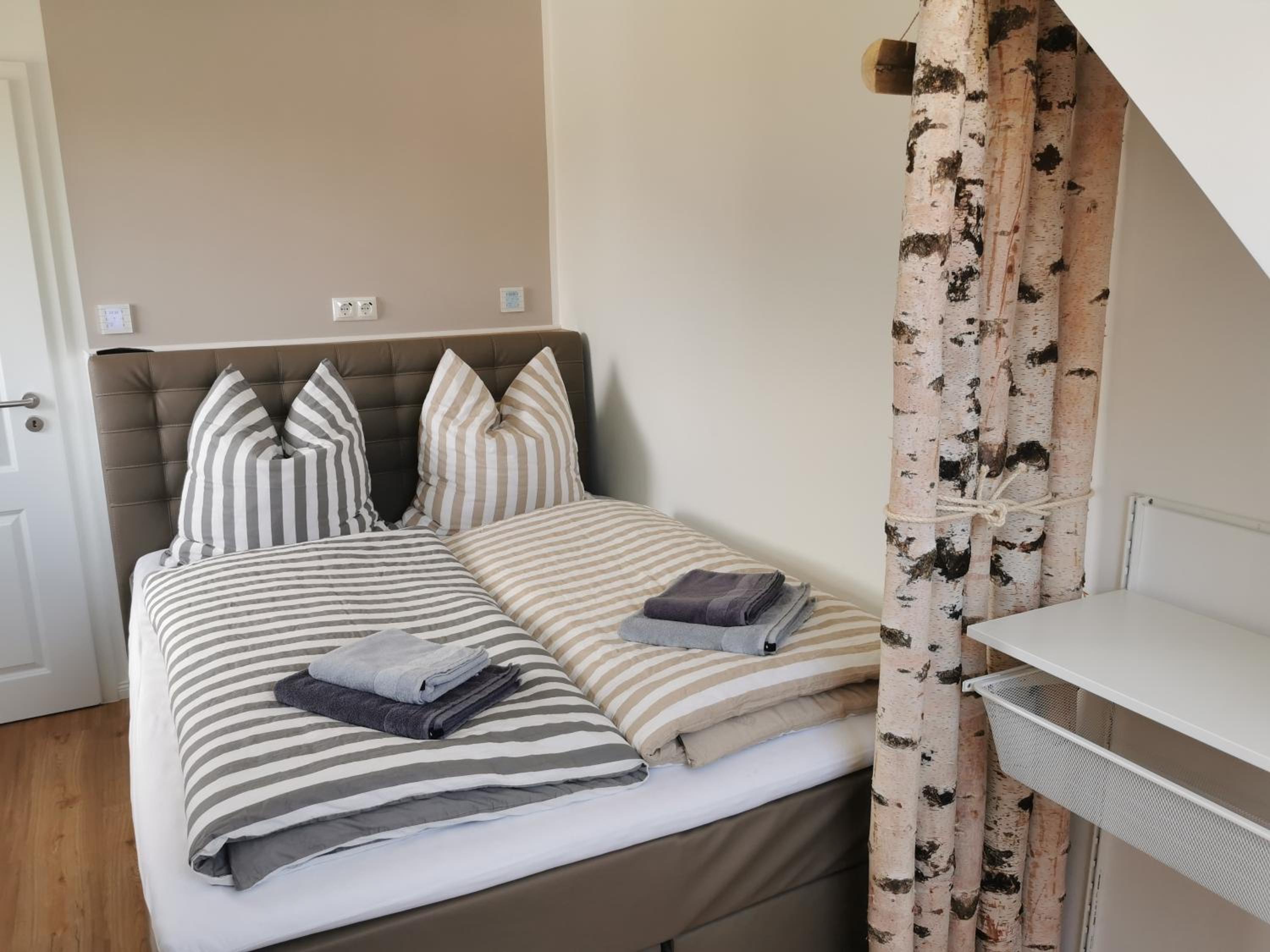 Moderne Wohnung mit Privatpool en Büsum — bedroom