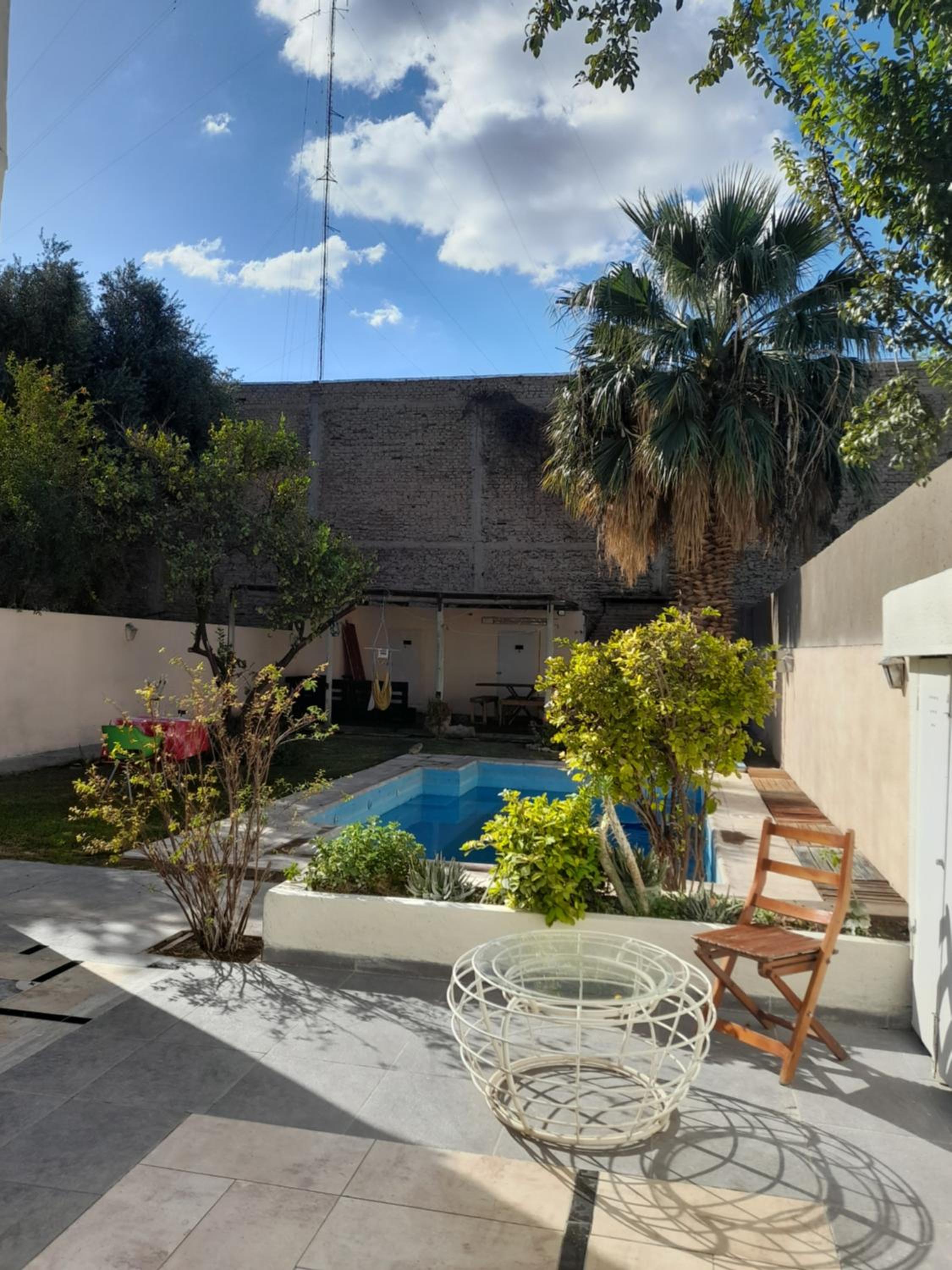 Casa con piscina y parrillero