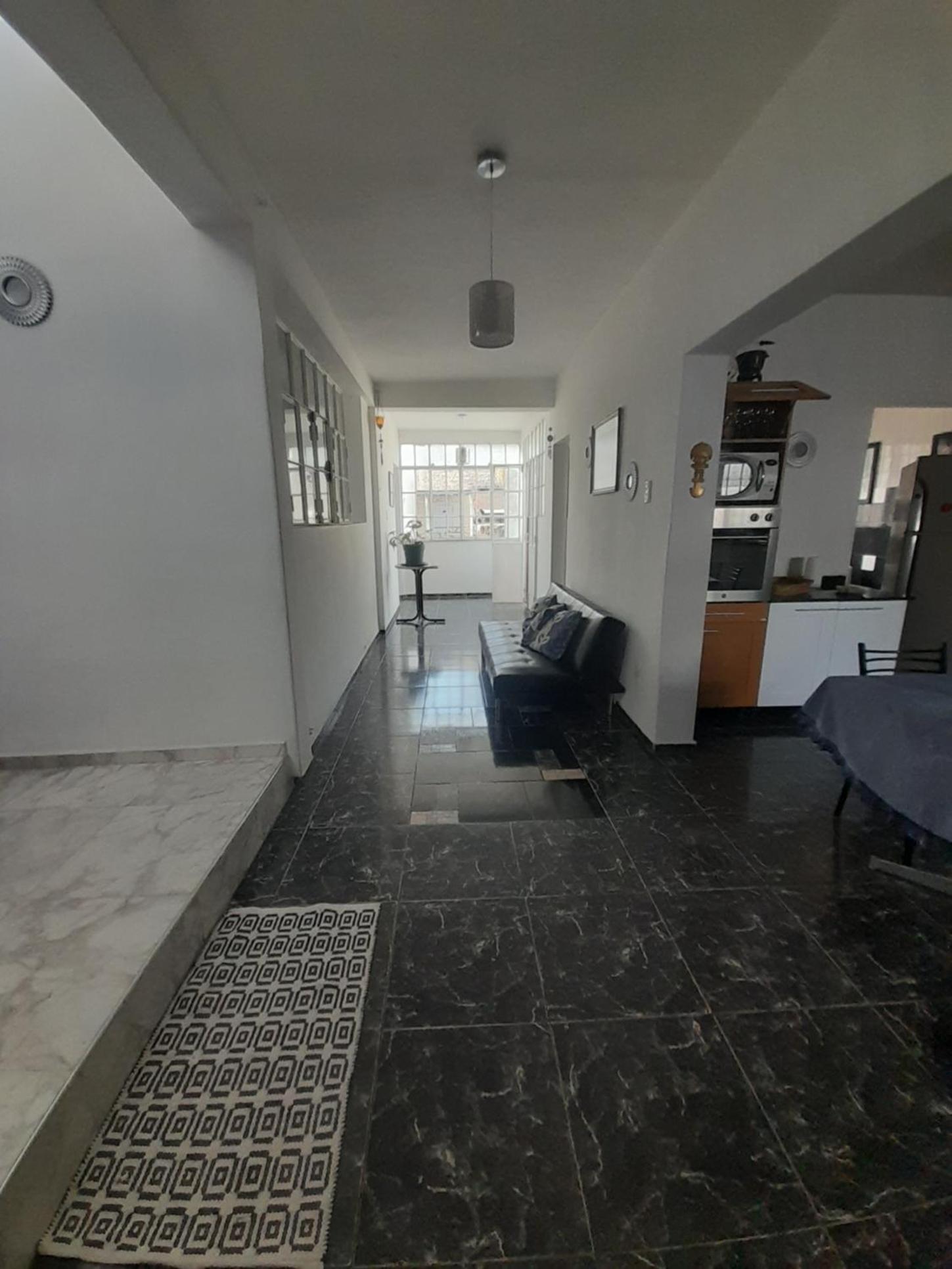 Casa con piscina y parrillero