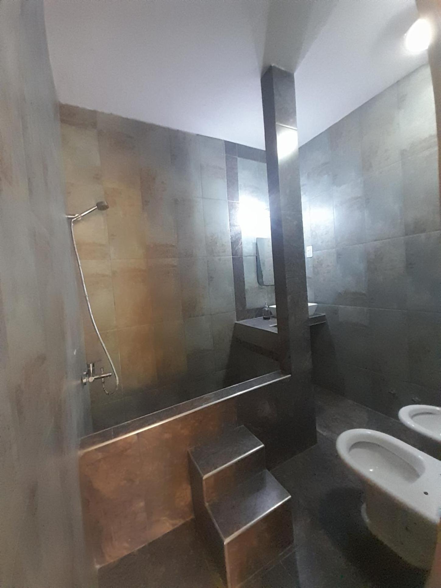 Casa con piscina y parrillero