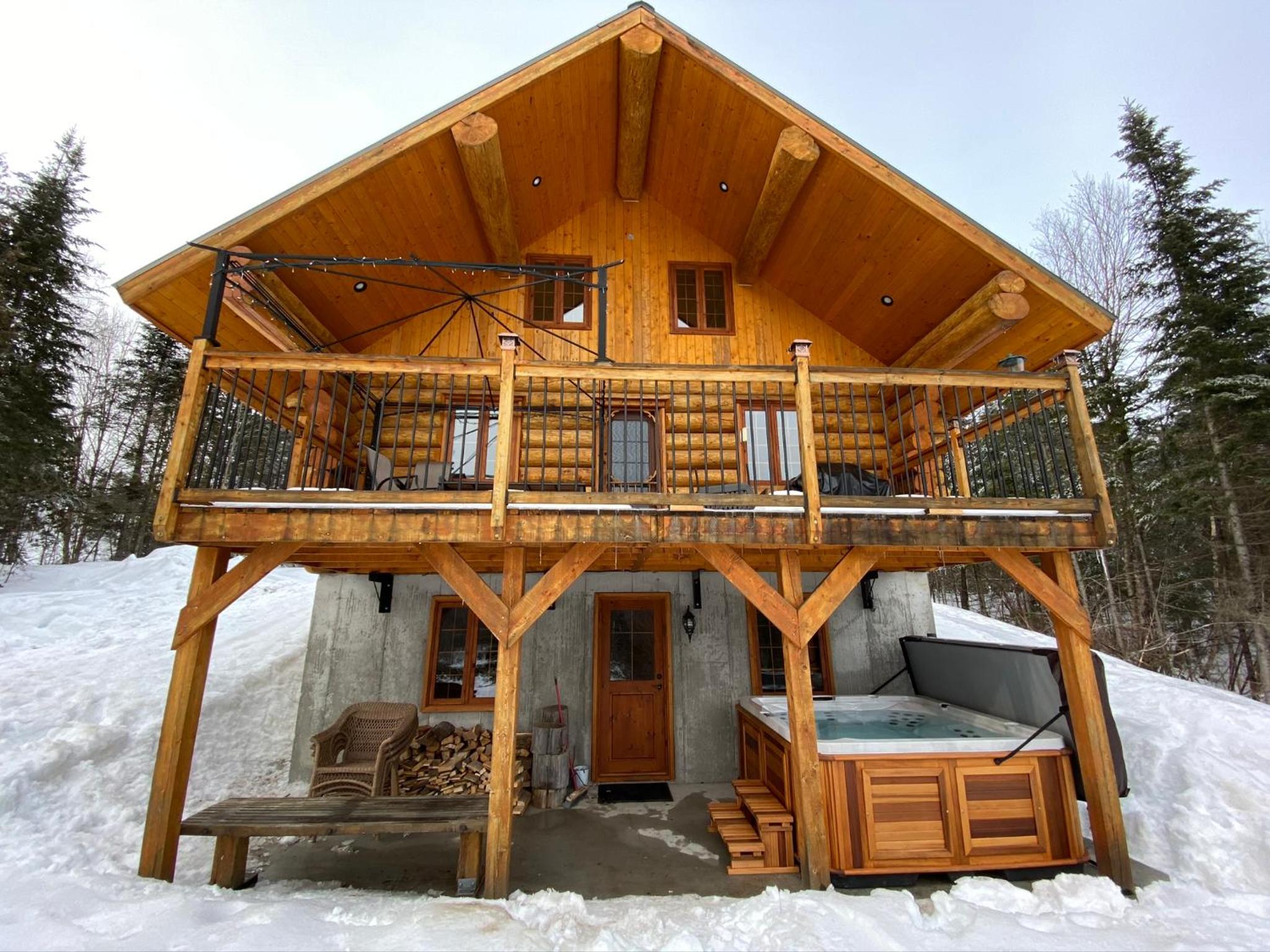 Chalet bois rond aux paysages uniques avec Spa !