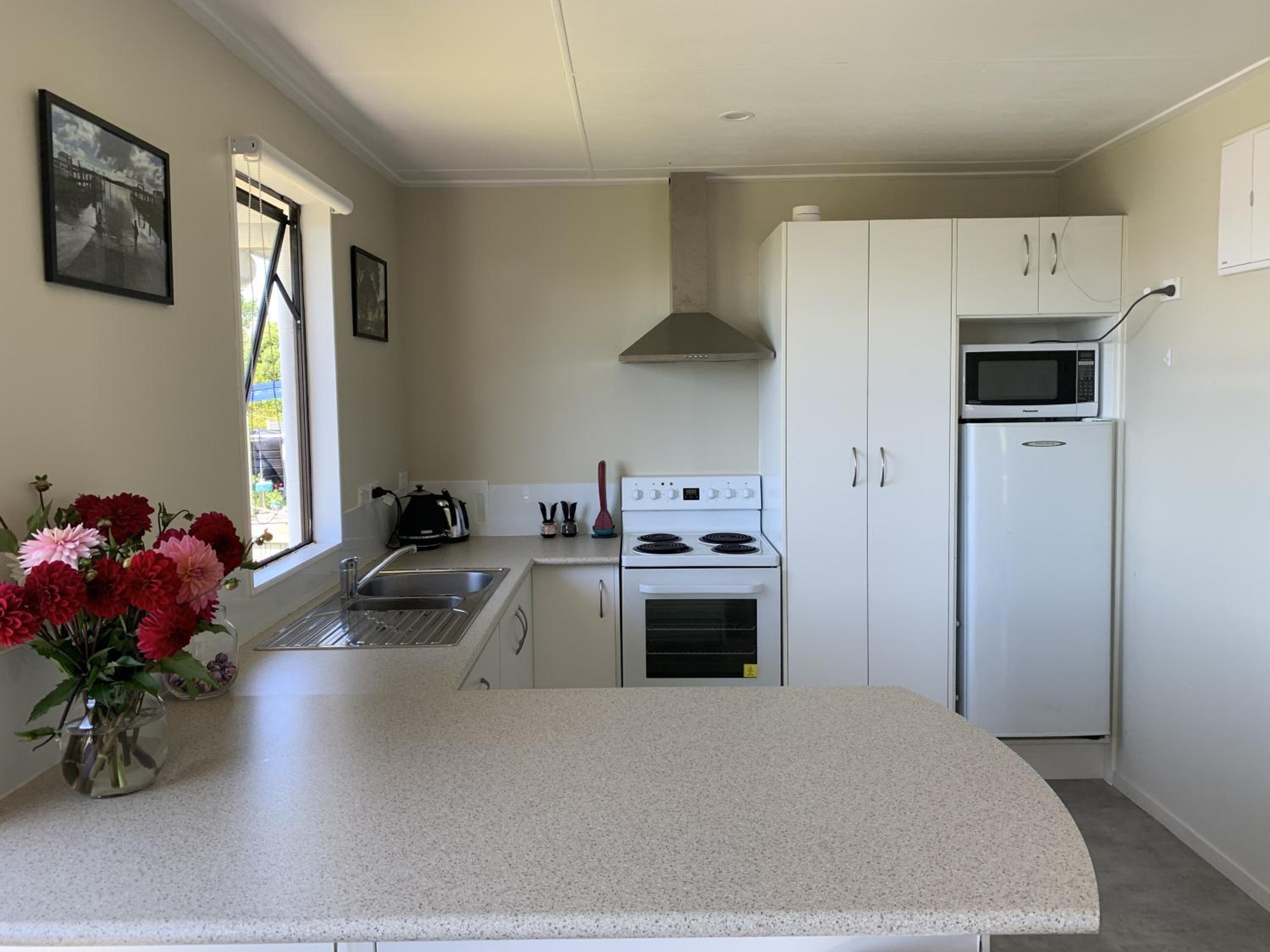 Peaceful Riverfront cottage in small northland town view 3