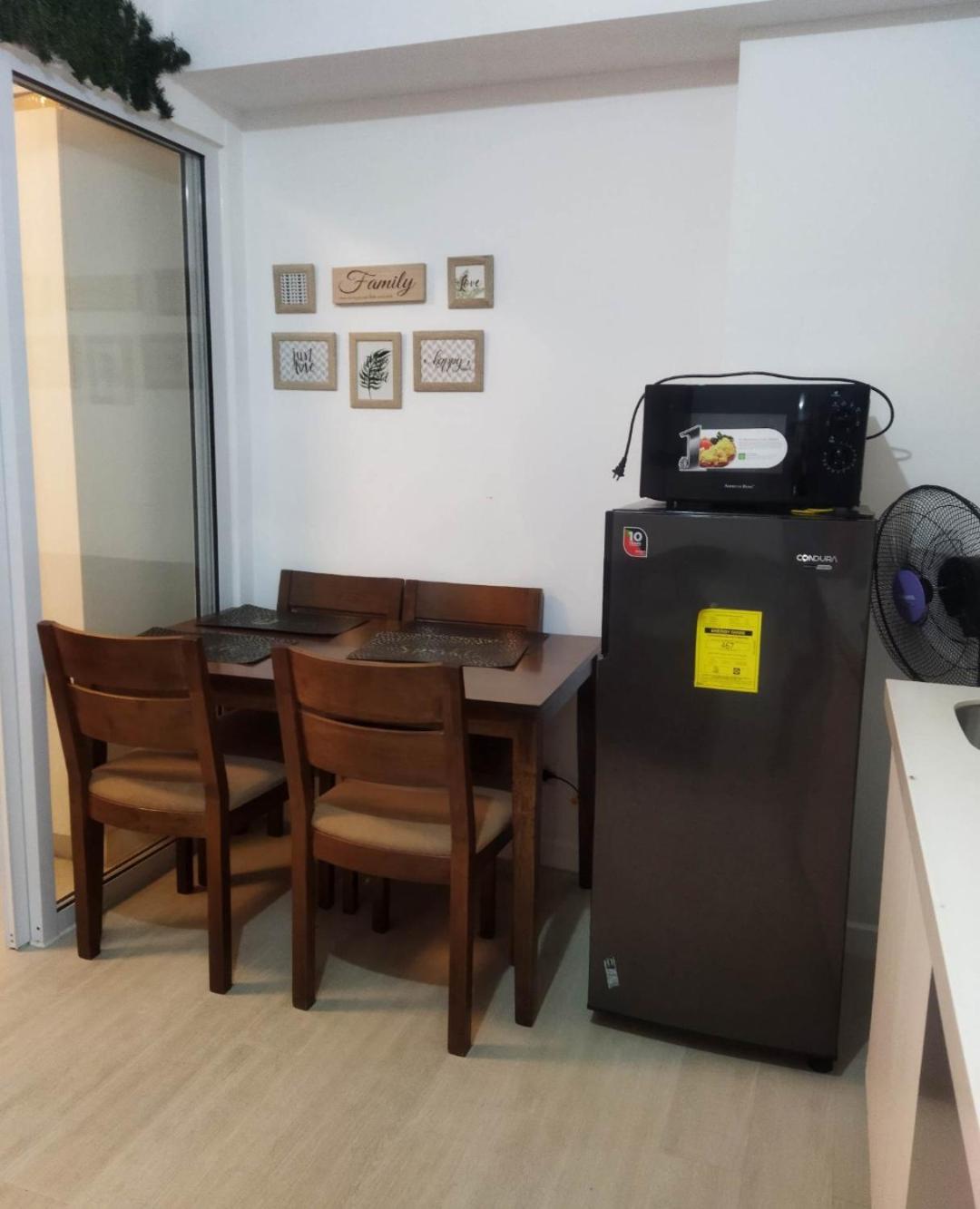 Room at SM Bicutan with Balcony view 5