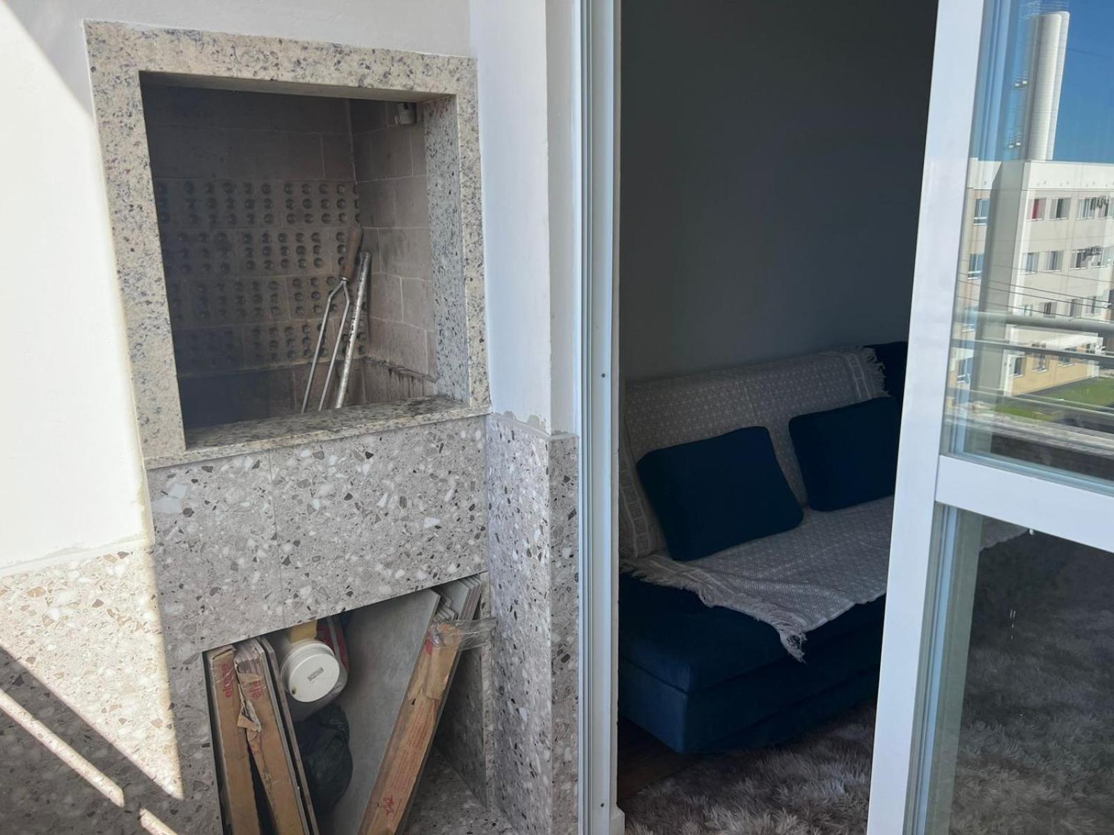 Lindo apartamento completo e com garagem coberta