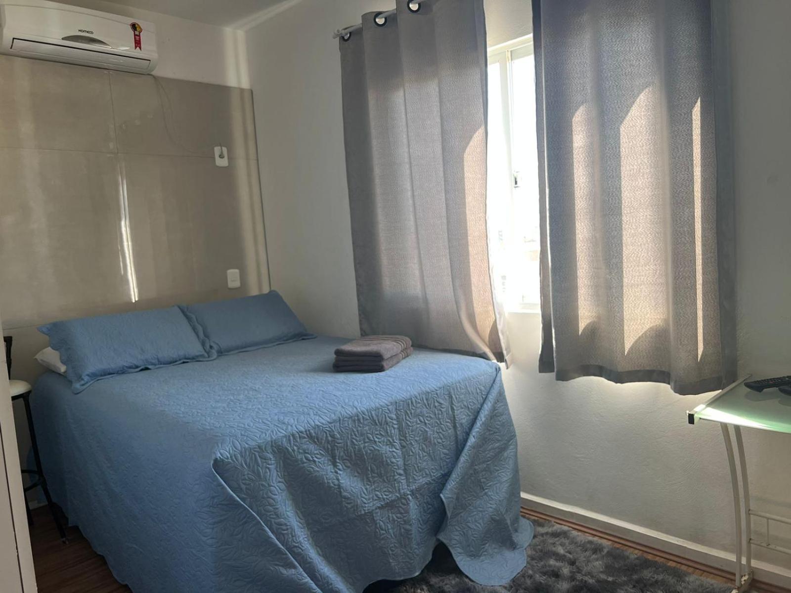 Lindo apartamento completo e com garagem coberta