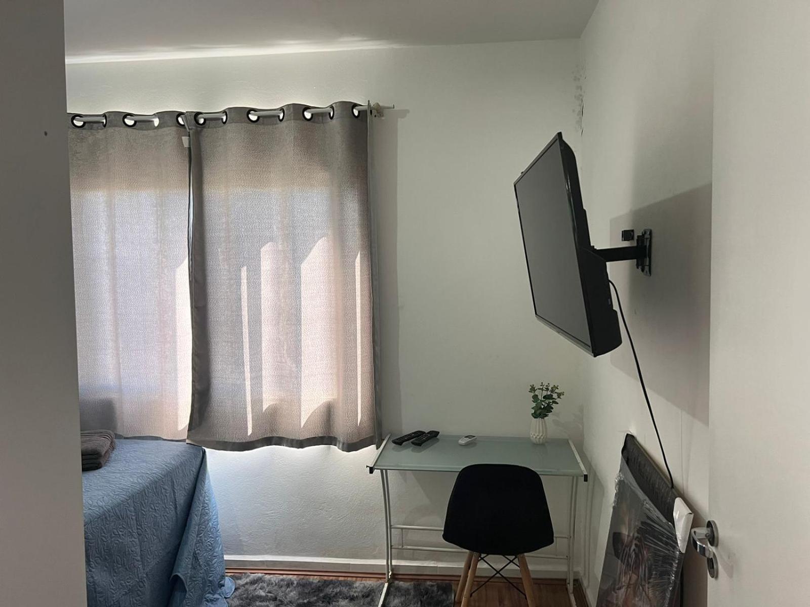 Lindo apartamento completo e com garagem coberta