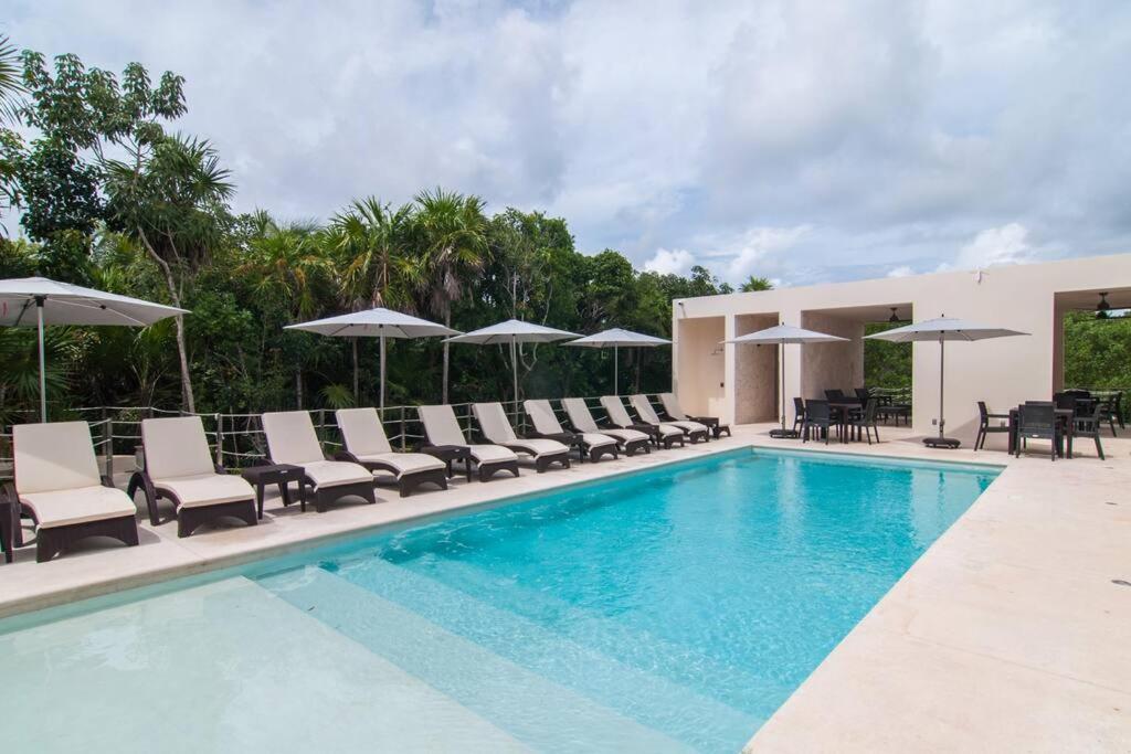 Ground level Garden condo at Akumal south by TAO Santamar