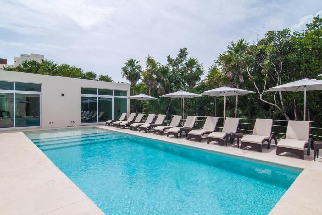 Ground level Garden condo at Akumal south by TAO Santamar