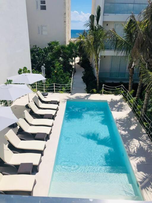 Ground level Garden condo at Akumal south by TAO Santamar