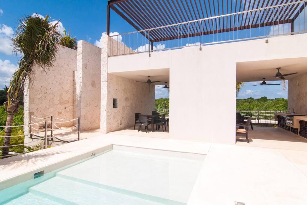 Ground level Garden condo at Akumal south by TAO Santamar