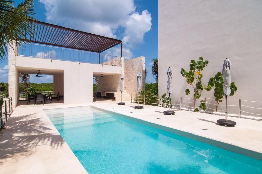 Ground level Garden condo at Akumal south by TAO Santamar