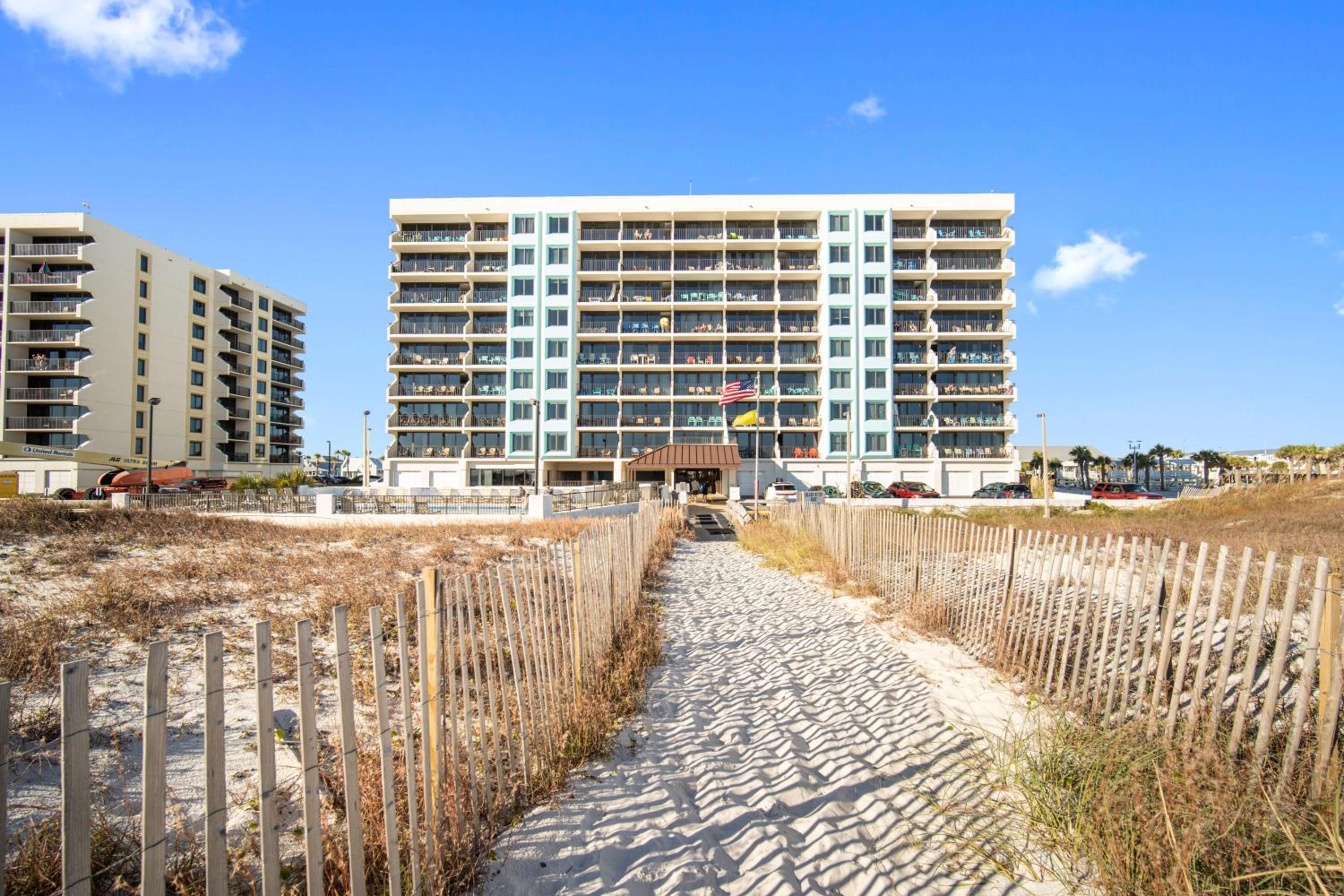 Island Winds East 202 by ALBVR - Beautifully renovated beachfront condo & steps away from Hangout & more!