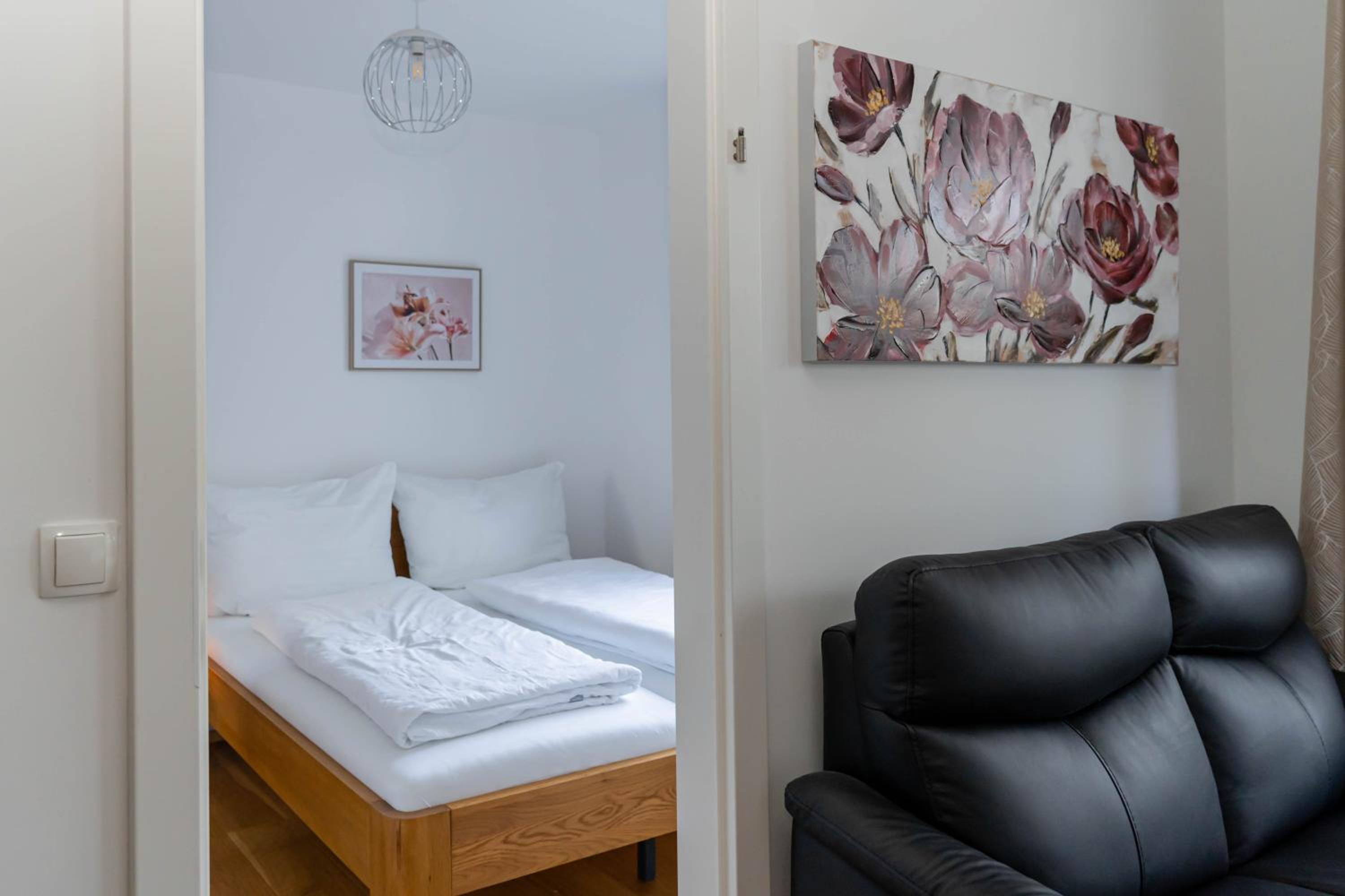 Modern apartment with tiny garden near city center