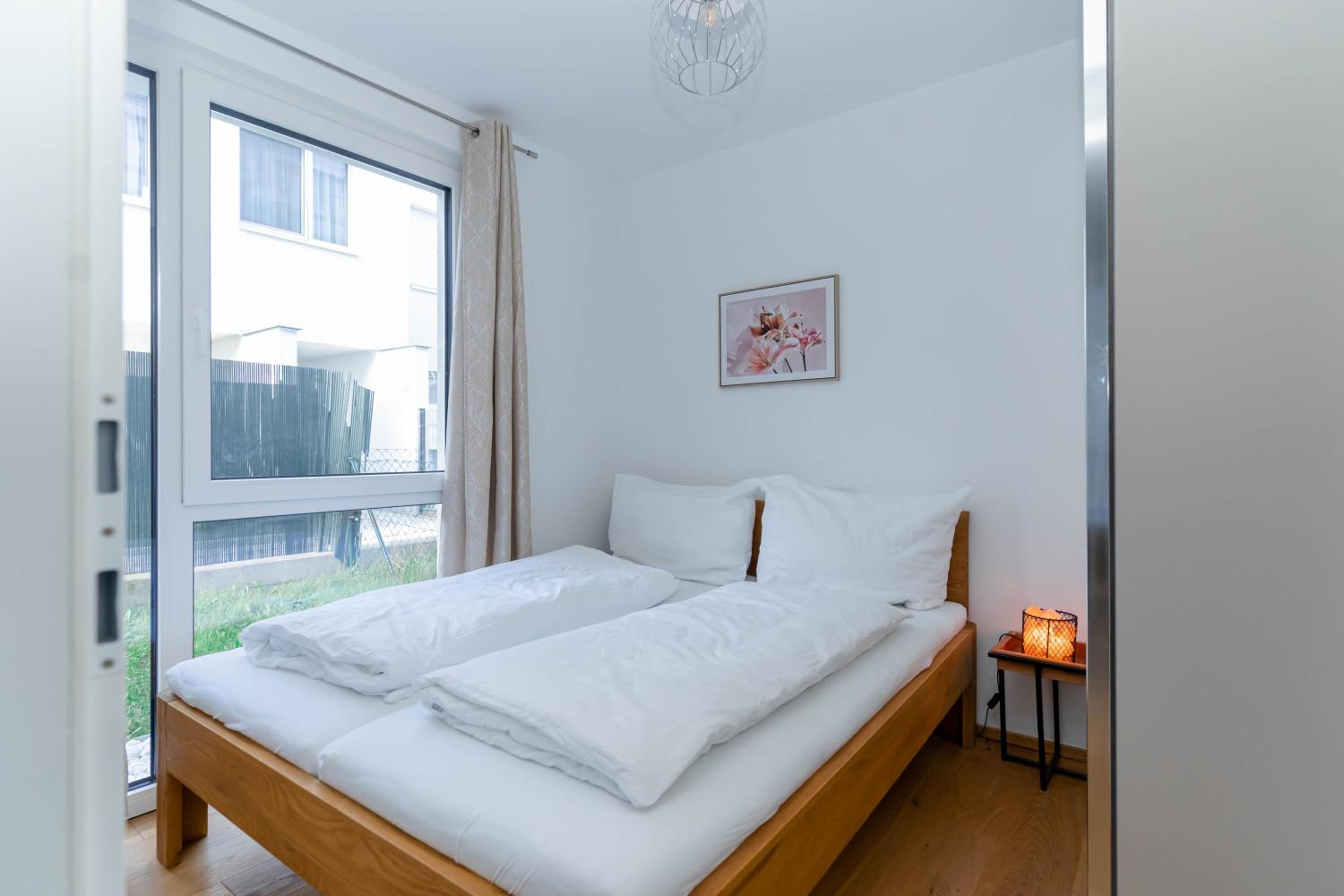 Modern apartment with tiny garden near city center