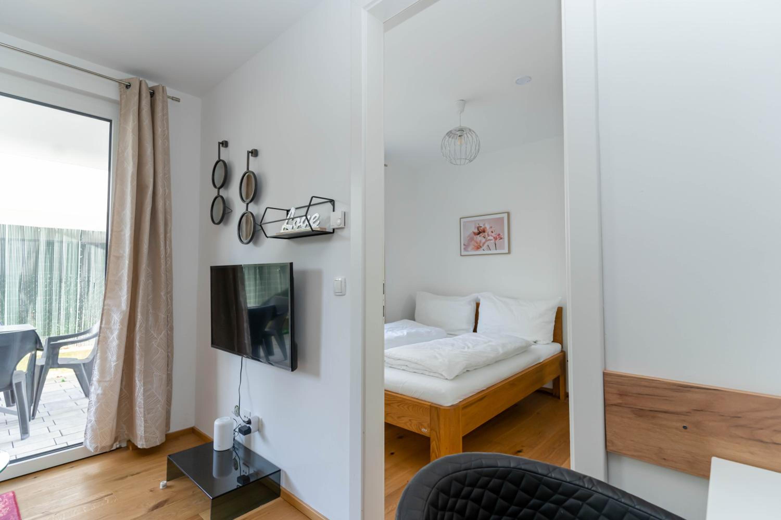 Modern apartment with tiny garden near city center