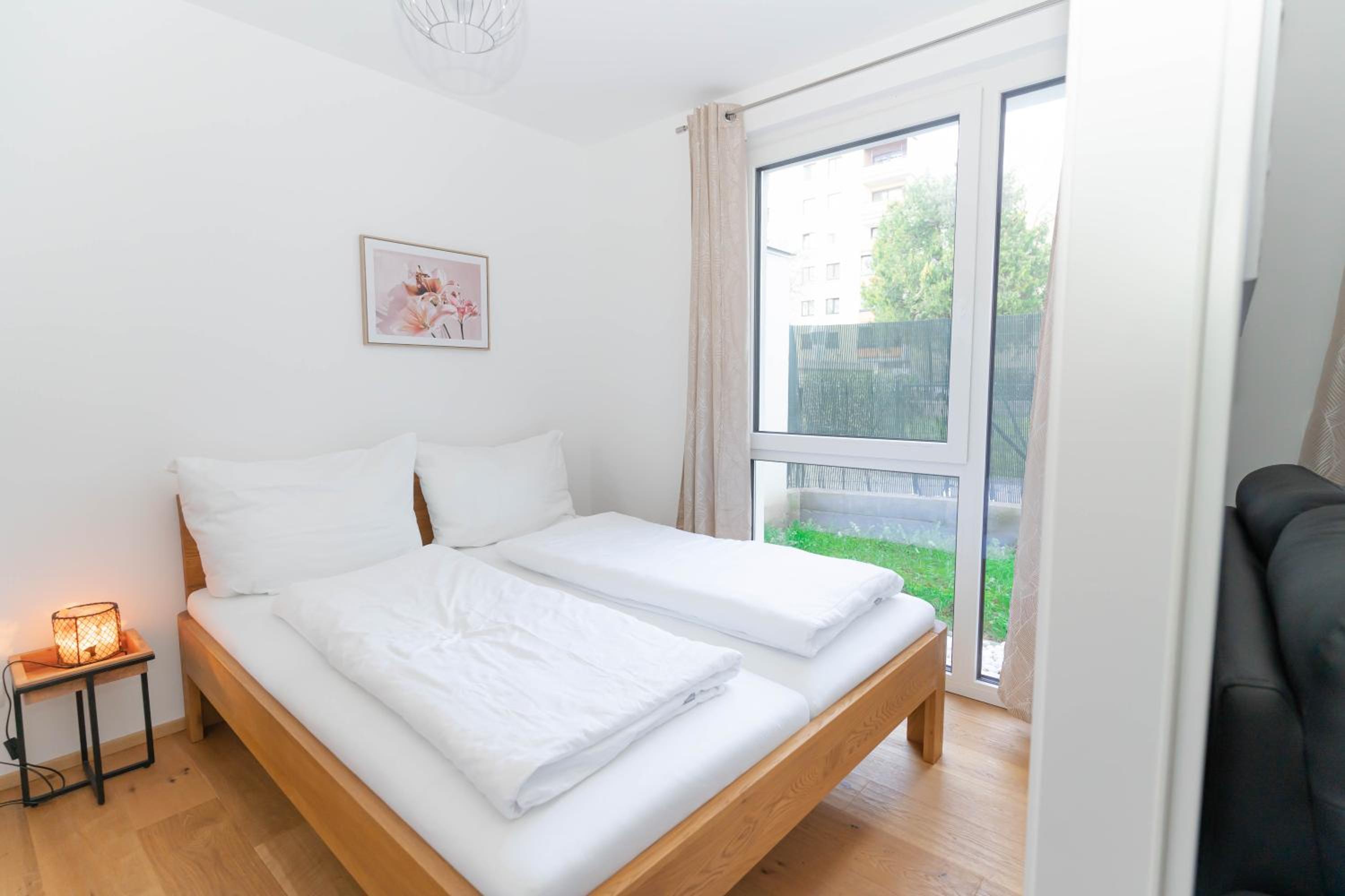 Modern apartment with tiny garden near city center