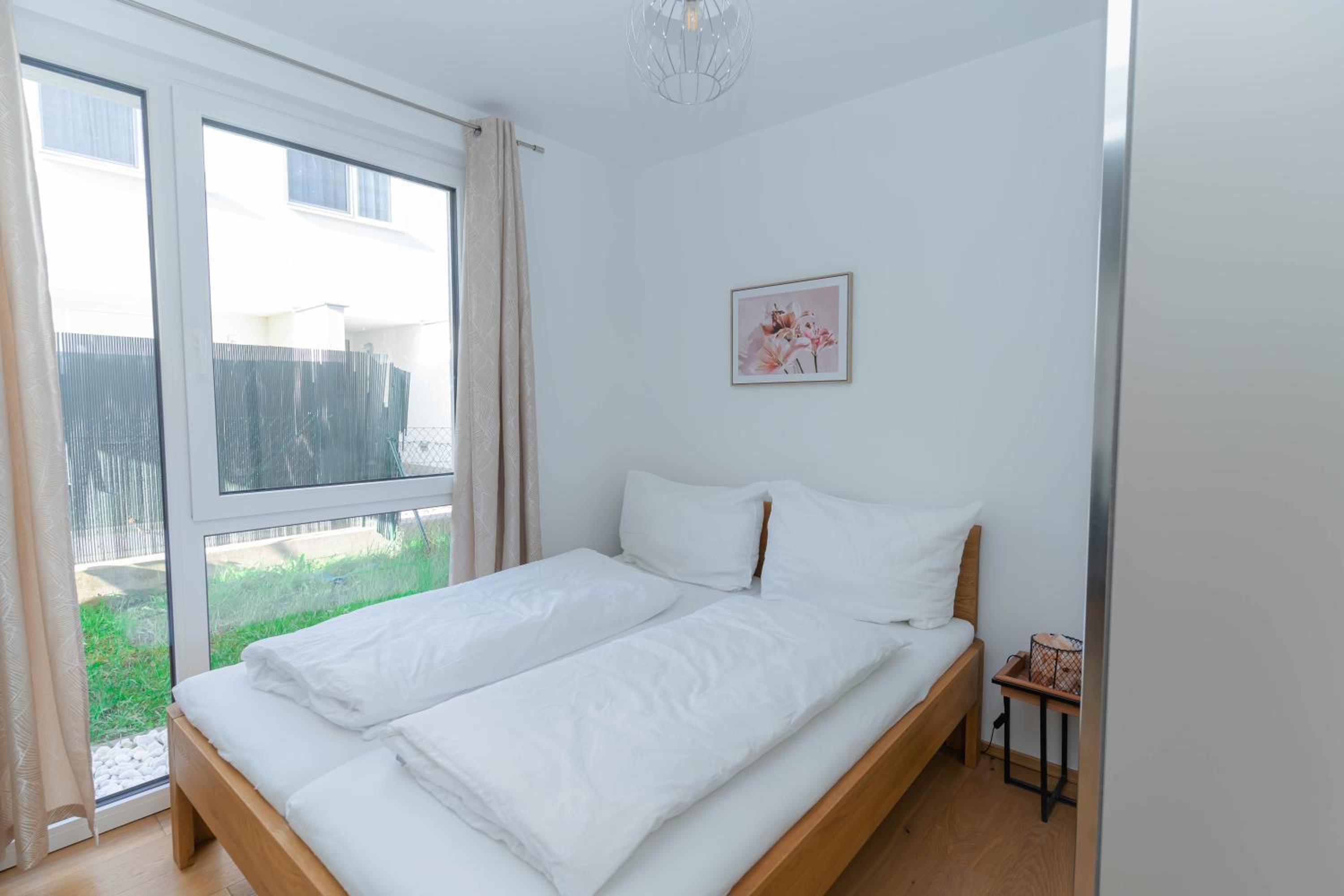 Modern apartment with tiny garden near city center