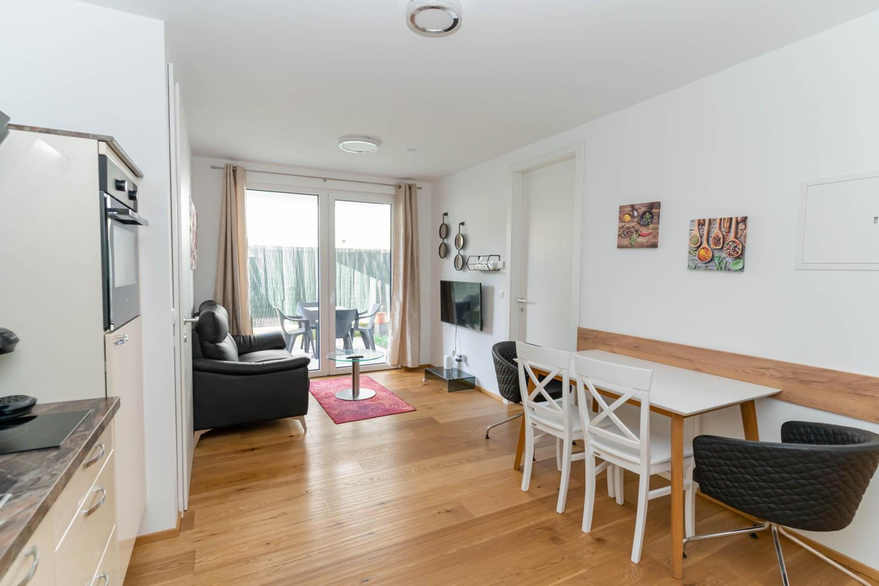Modern apartment with tiny garden near city center