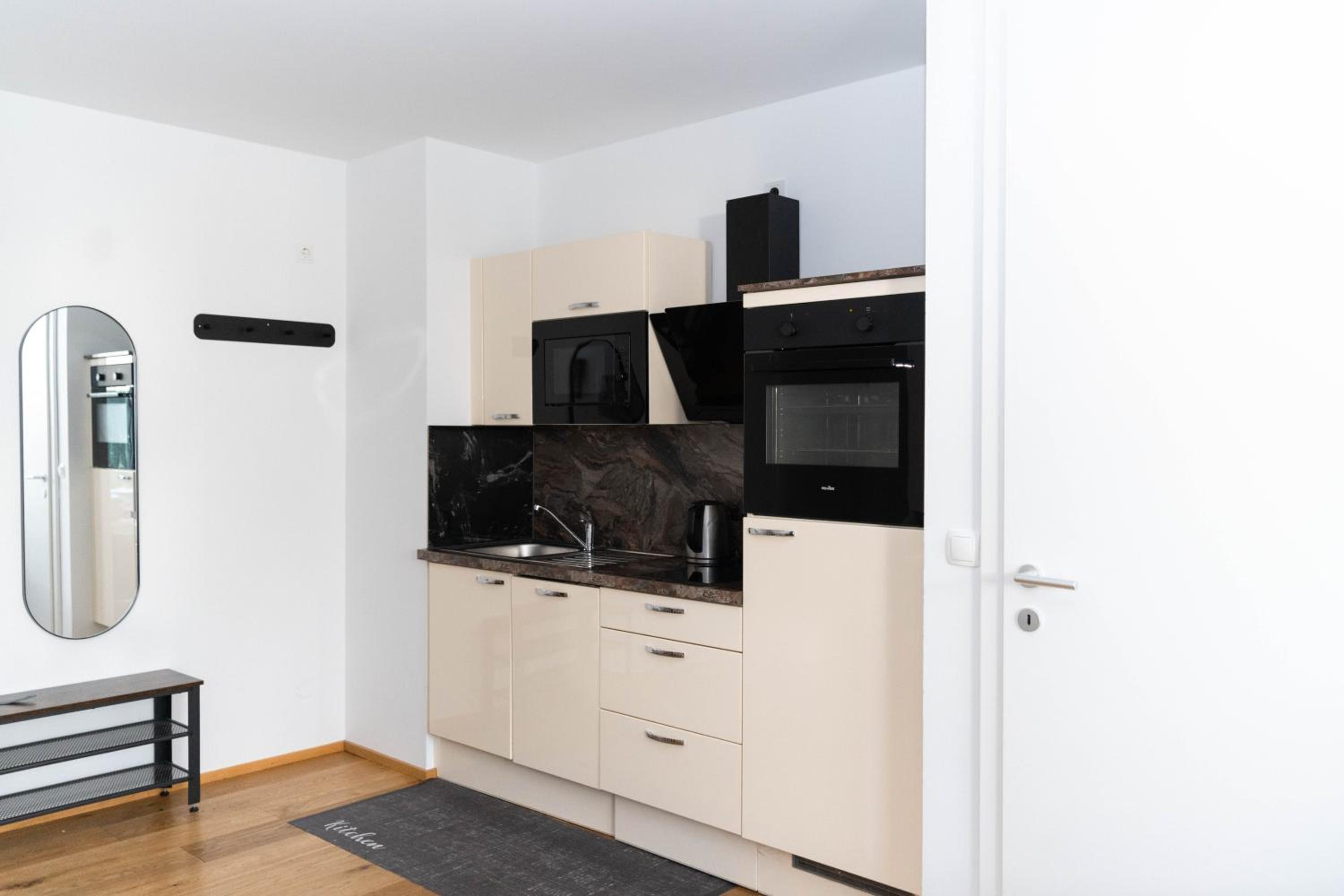 Modern apartment with tiny garden near city center