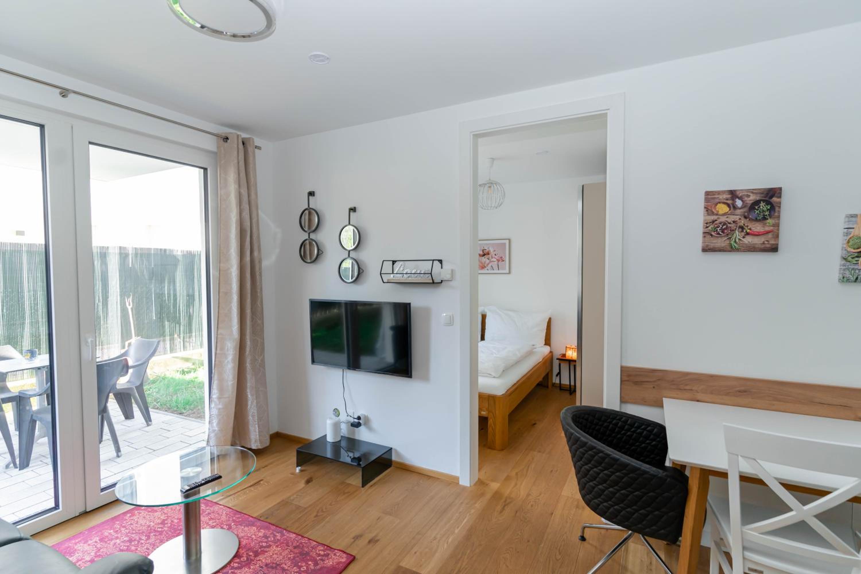 Modern apartment with tiny garden near city center