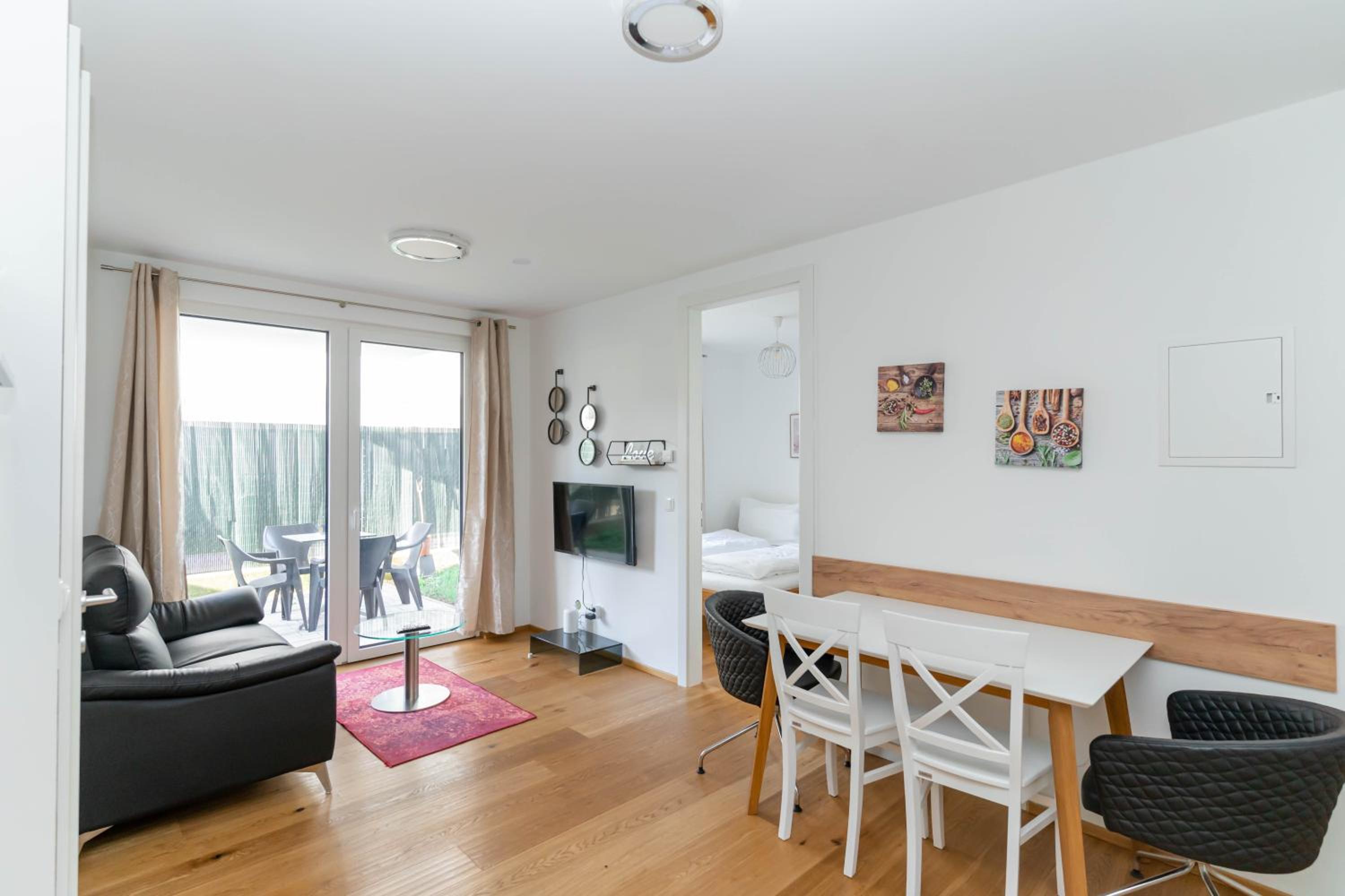 Modern apartment with tiny garden near city center