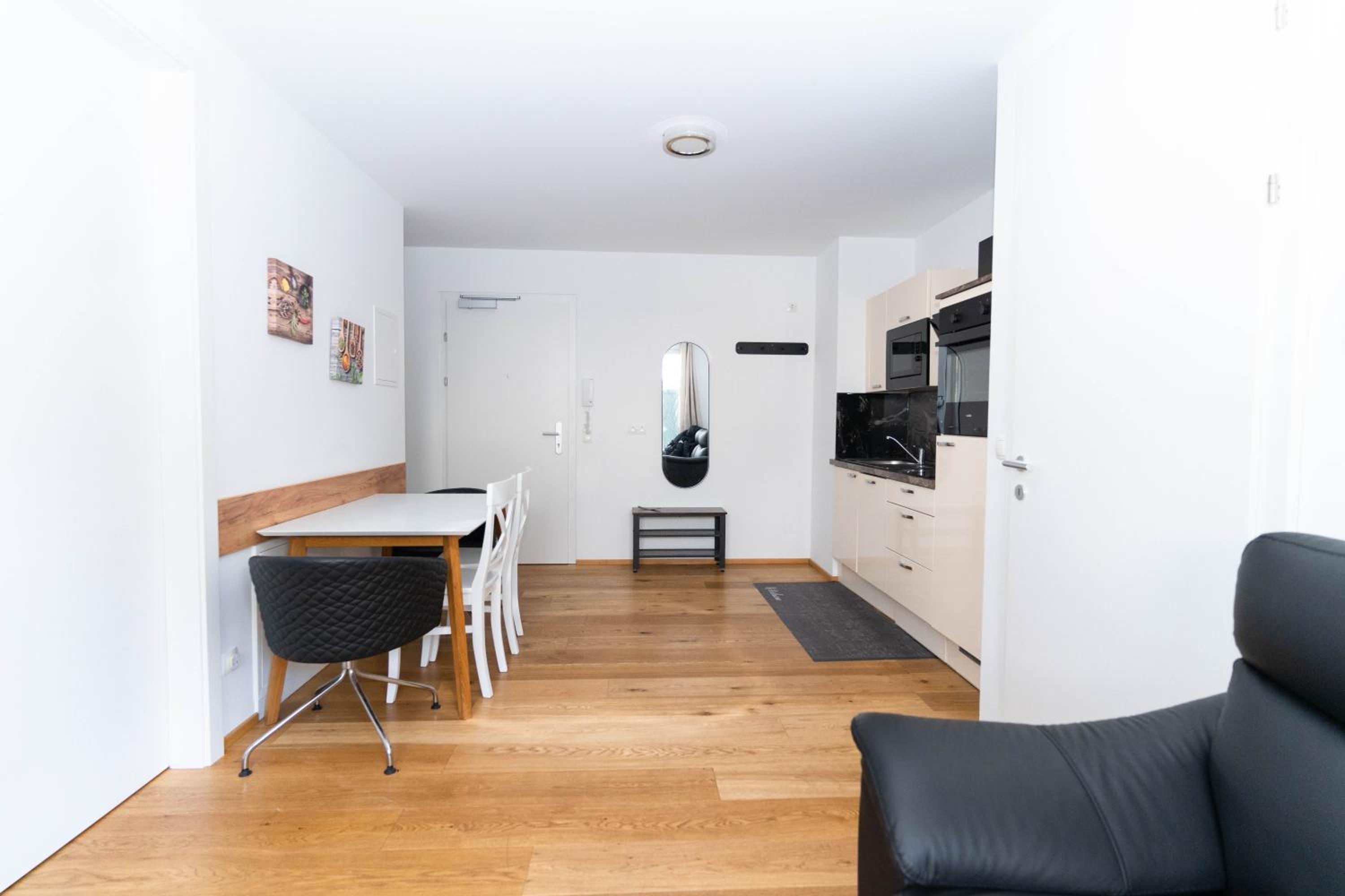 Modern apartment with tiny garden near city center