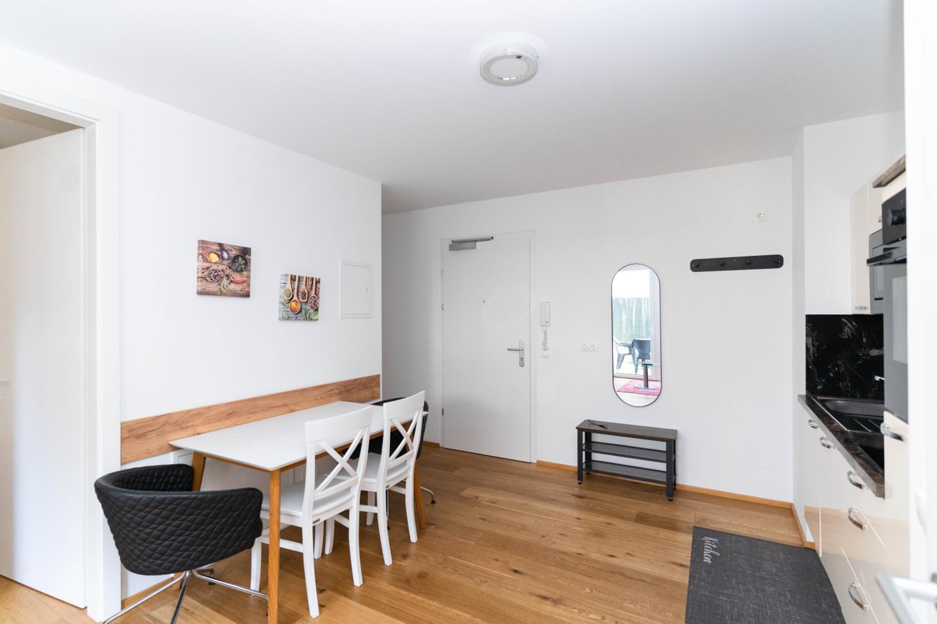 Modern apartment with tiny garden near city center