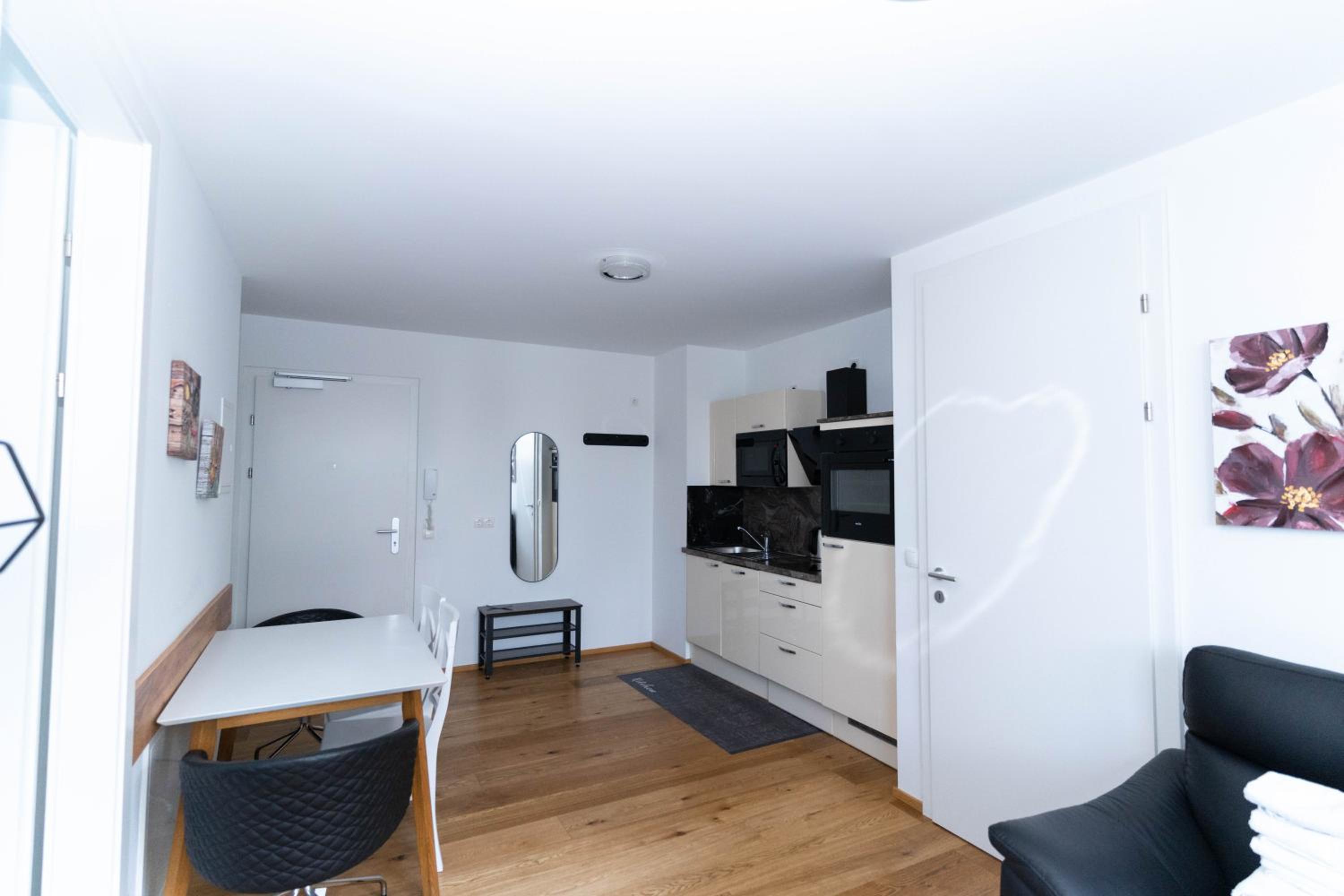 Modern apartment with tiny garden near city center