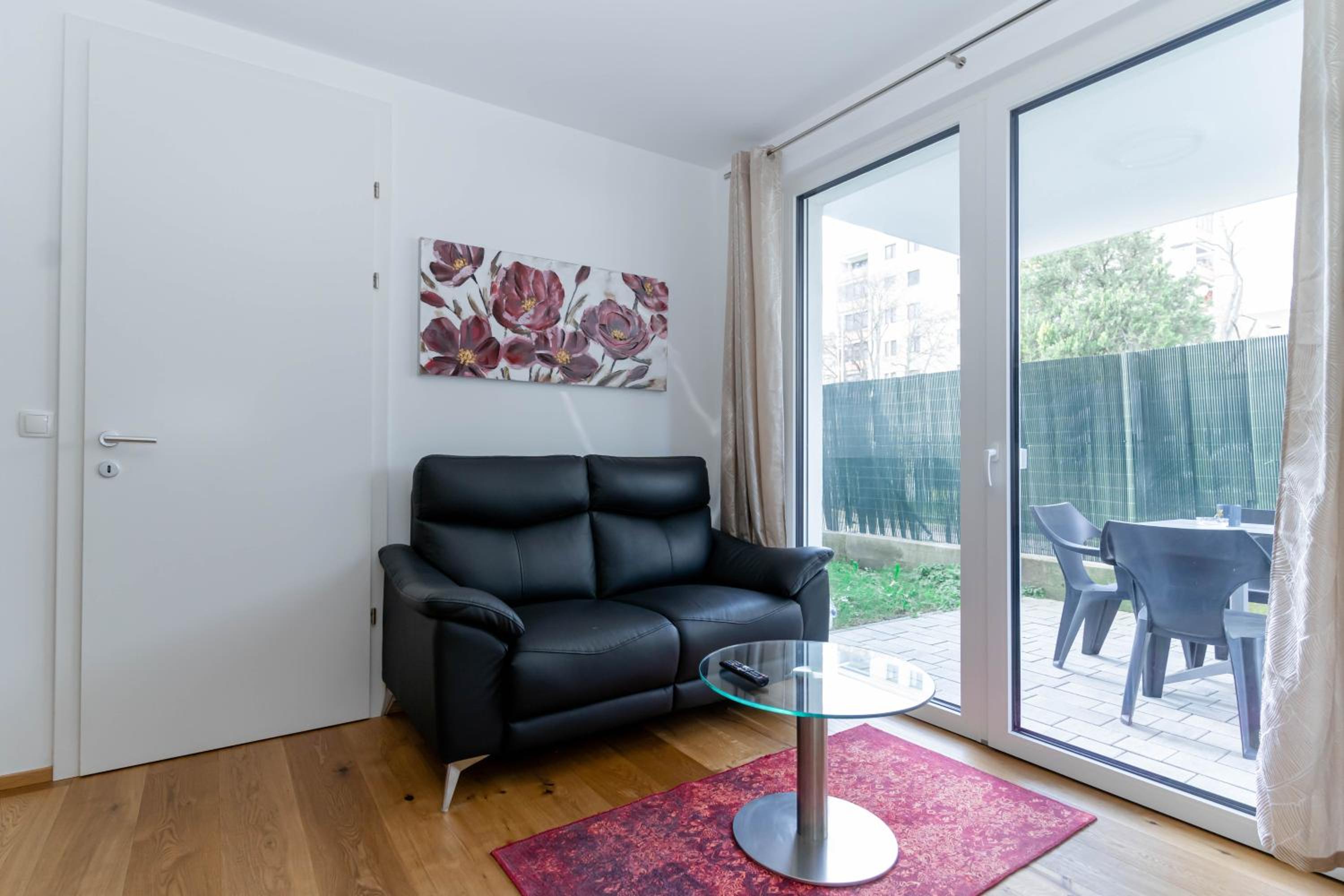 Modern apartment with tiny garden near city center