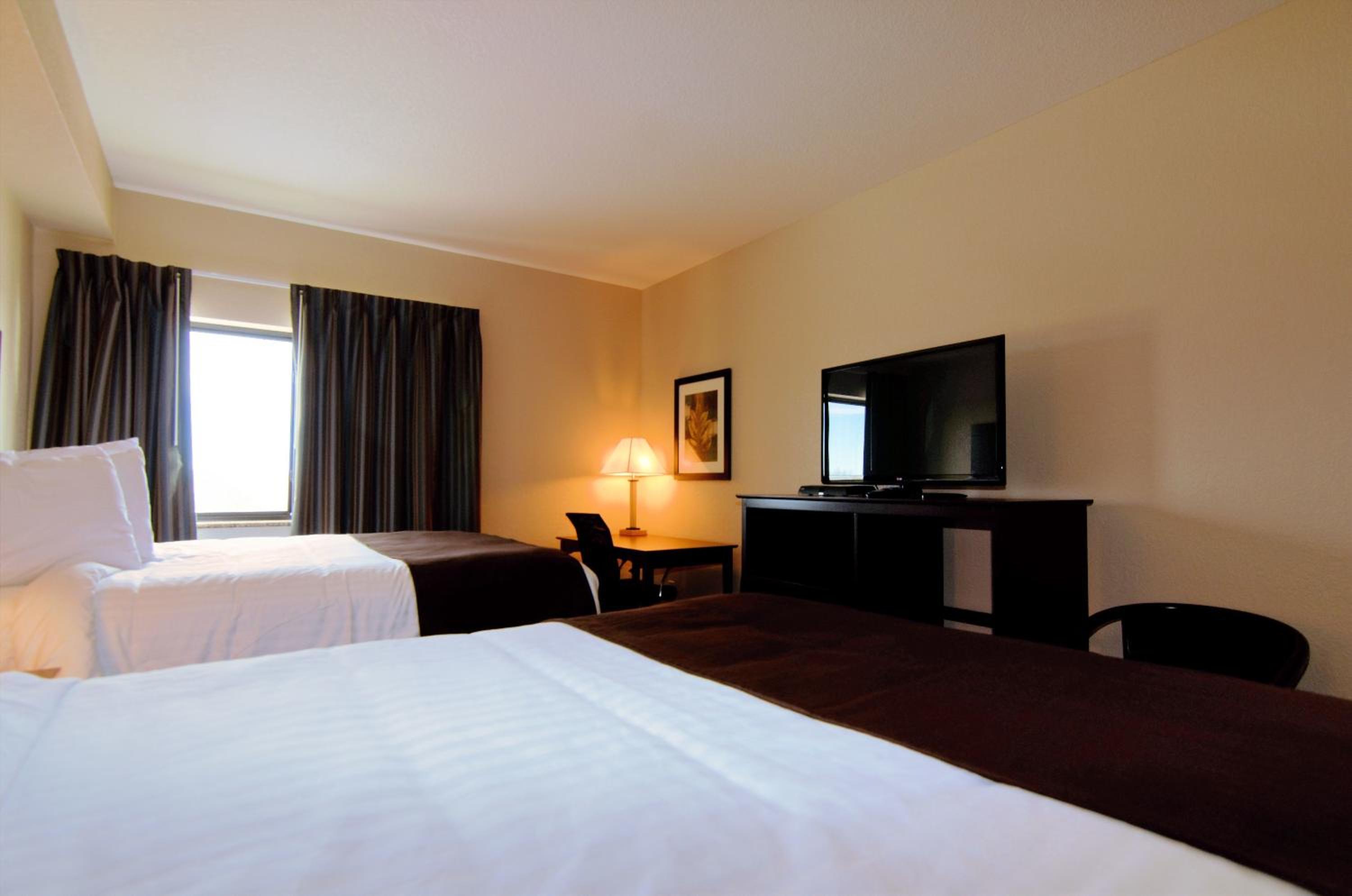 Cobblestone Inn & Suites - Denison | Oak Ridge