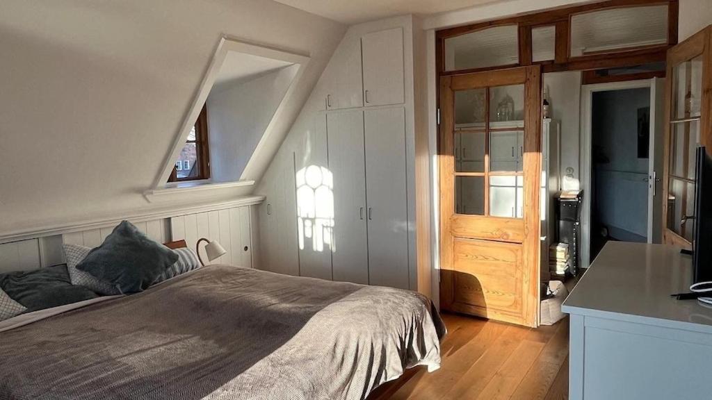 Reetdachhaus Warft Simmerdeis - Maisonettewohnung