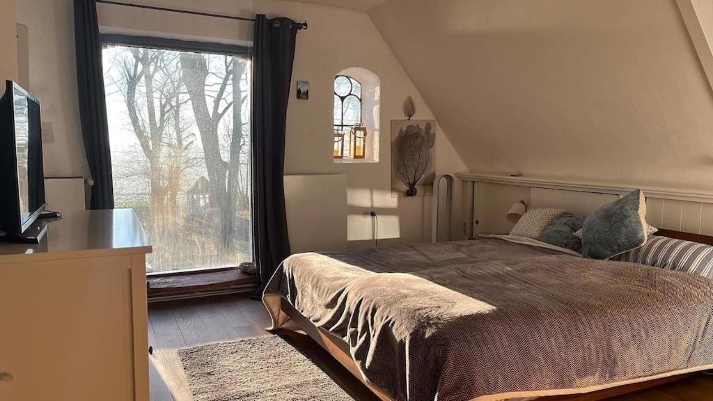 Reetdachhaus Warft Simmerdeis - Maisonettewohnung