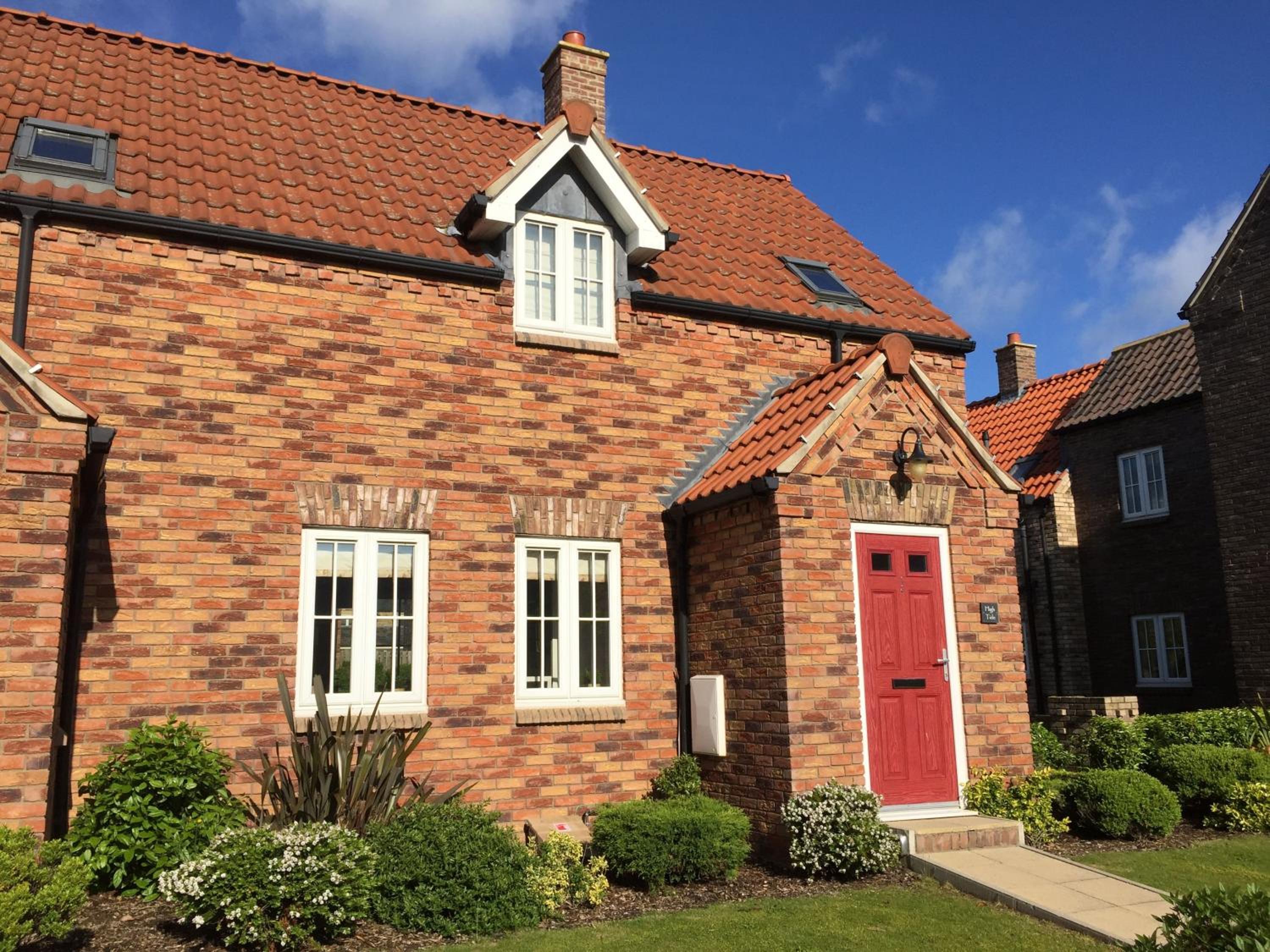High Tide Cottage - Part of the The Bay Filey Holiday Village with pool, gym and direct beach access, pub, restaurant, tennis and meadows walks