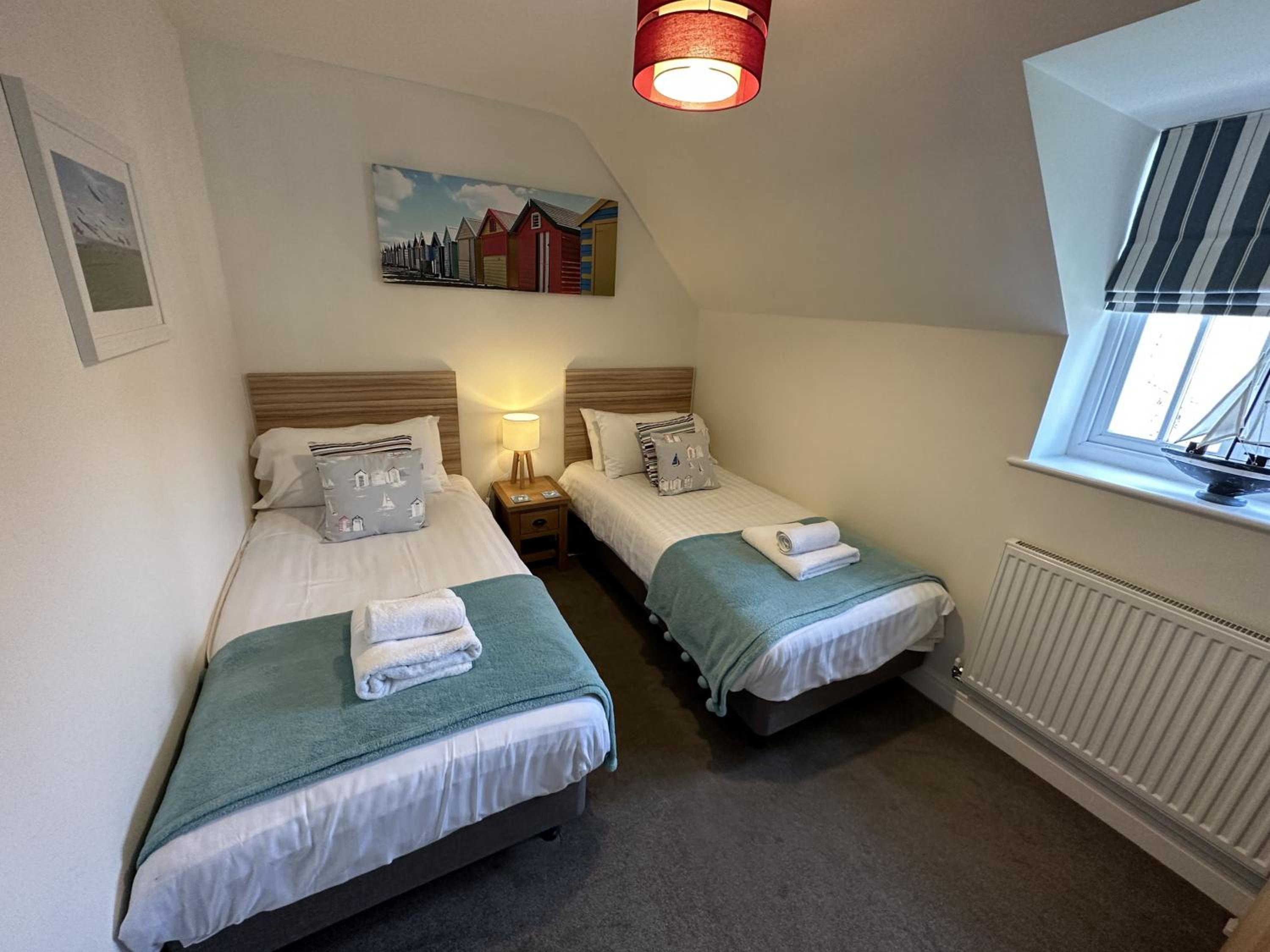 High Tide Cottage - Part of the The Bay Filey Holiday Village with pool, gym and direct beach access, pub, restaurant, tennis and meadows walks