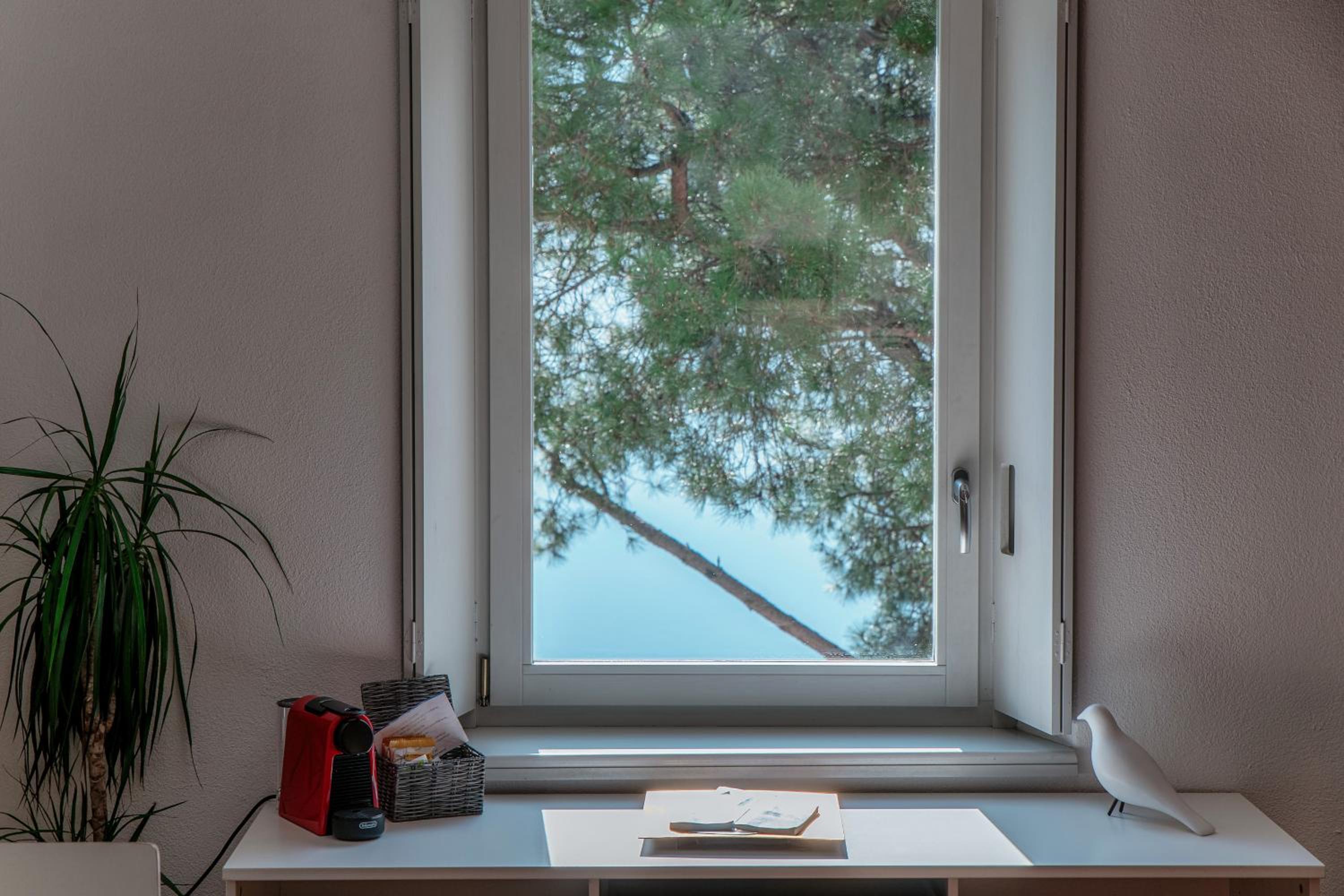 SIN4 Apartments by Quokka 360 - overlooking the lake - FAI heritage in Morcote