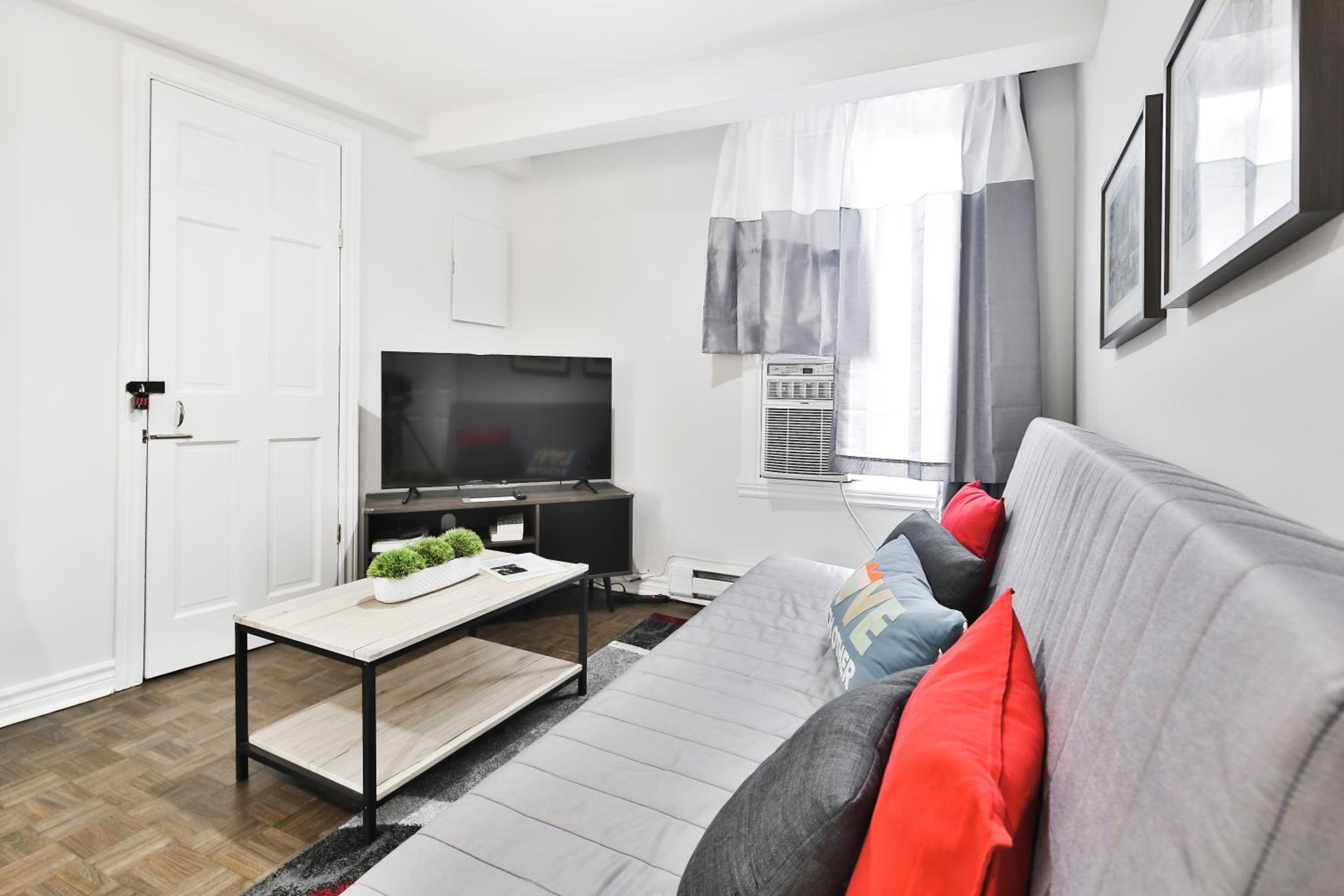 250 METERS to METRO BERRI UQAM - Spacious fully equipped APARTMENTS - 1 FREE PARKING per unit - in-unit Washer & Dryer - fully stocked KITCHEN - WORKSPACE 