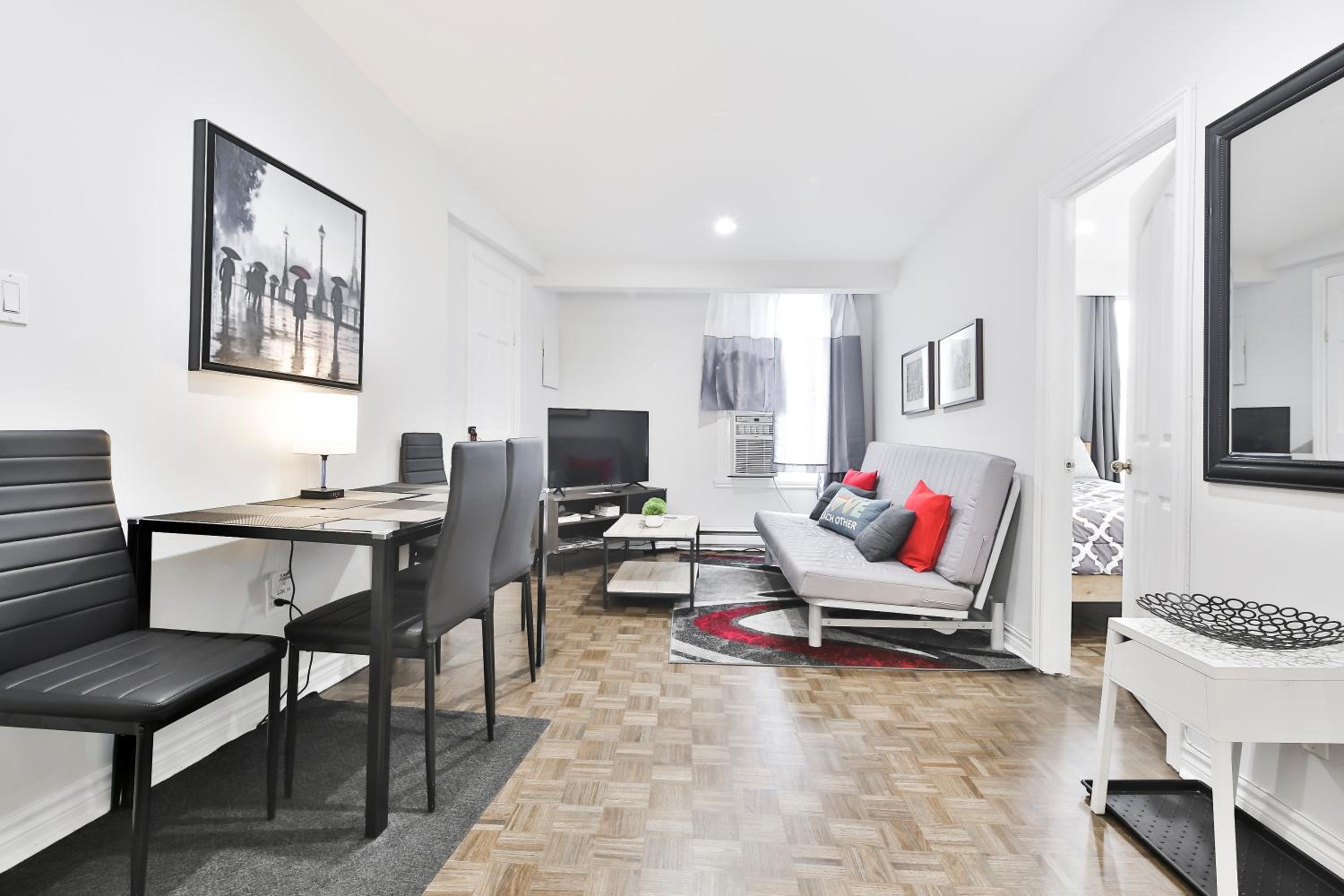 250 METERS to METRO BERRI UQAM - Spacious fully equipped APARTMENTS - 1 FREE PARKING per unit - in-unit Washer & Dryer - fully stocked KITCHEN - WORKSPACE 