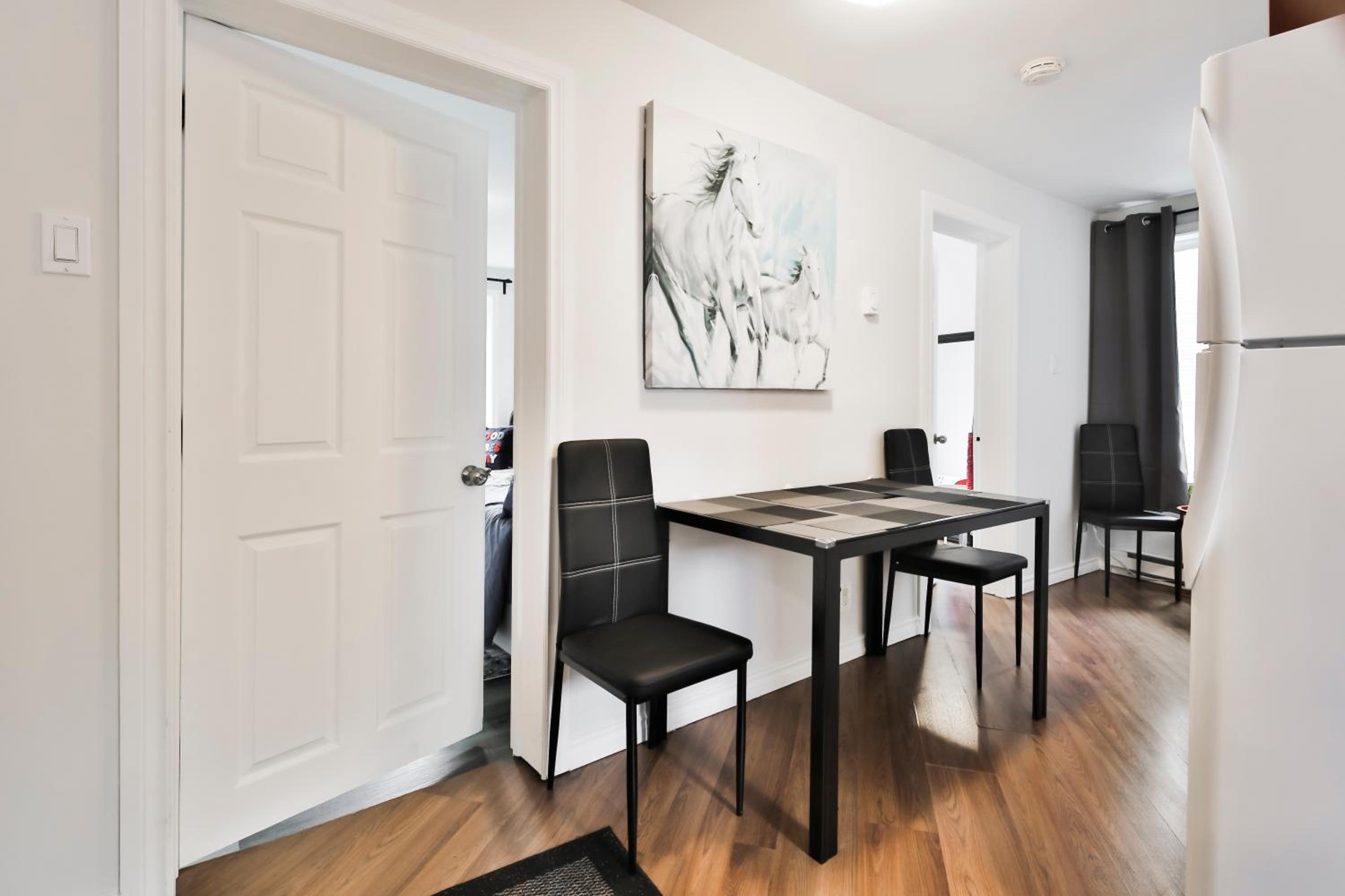 250 METERS to METRO BERRI UQAM - Spacious fully equipped APARTMENTS - 1 FREE PARKING per unit - in-unit Washer & Dryer - fully stocked KITCHEN - WORKSPACE 