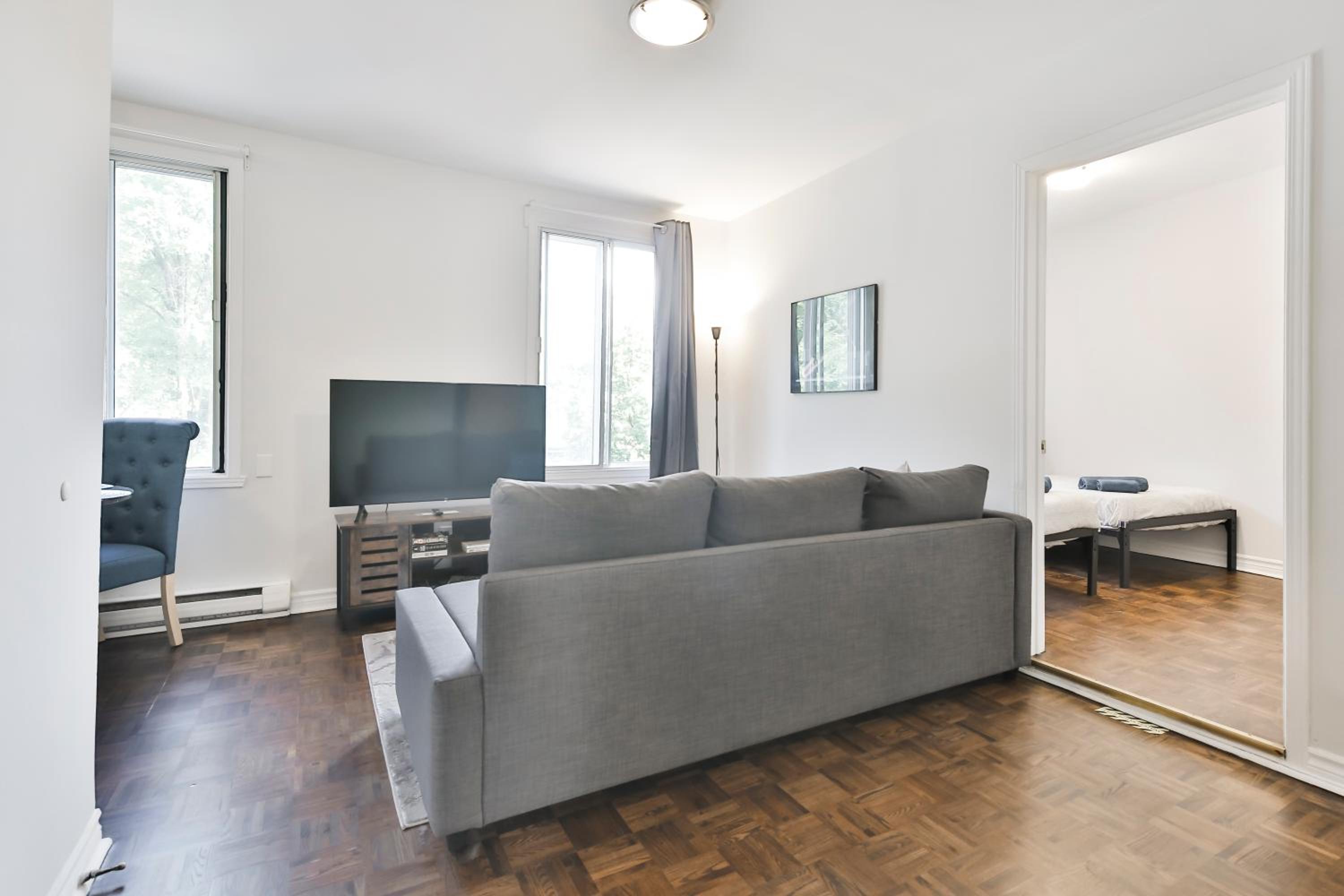 250 METERS to METRO BERRI UQAM - Spacious fully equipped APARTMENTS - 1 FREE PARKING per unit - in-unit Washer & Dryer - fully stocked KITCHEN - WORKSPACE 