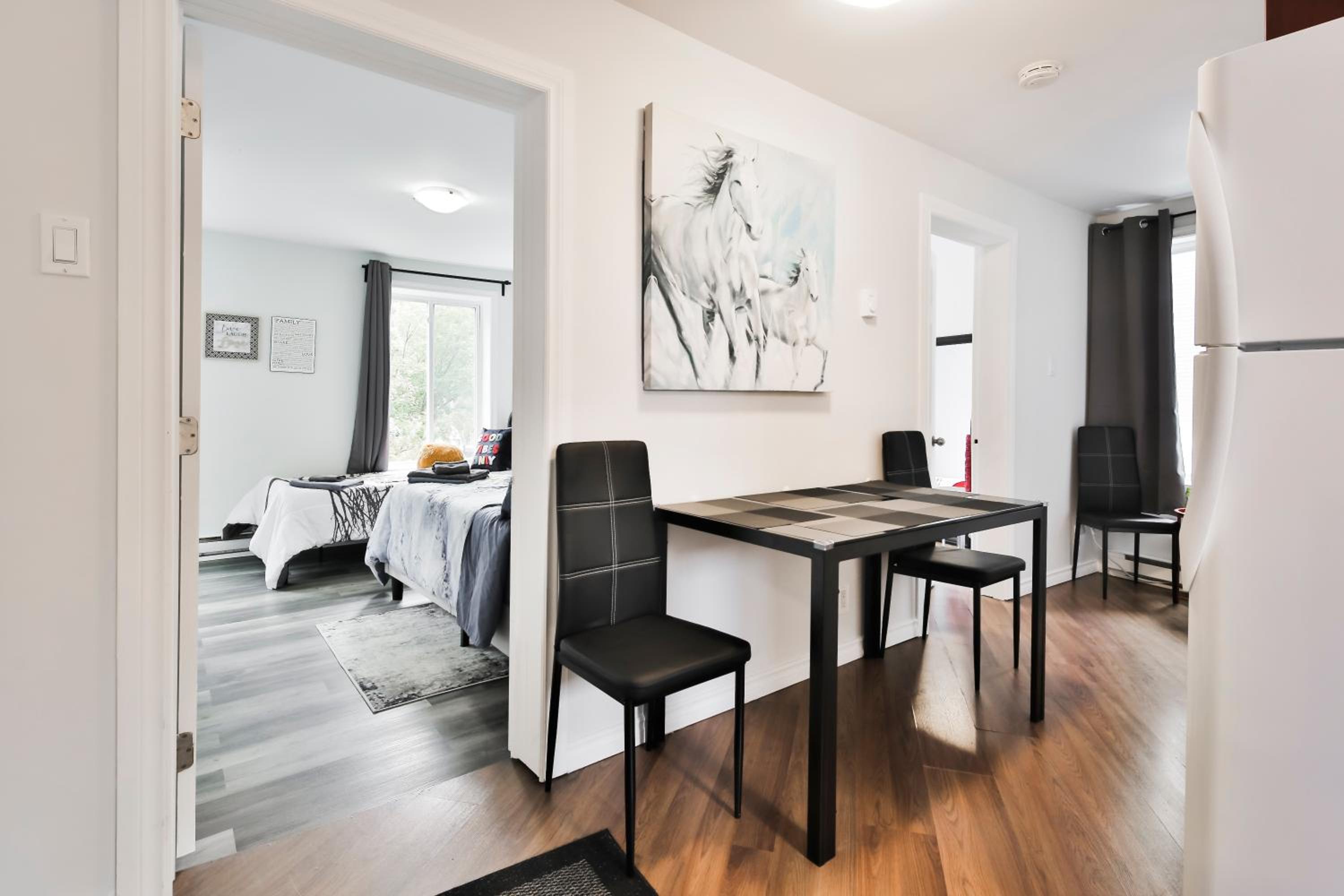 250 METERS to METRO BERRI UQAM - Spacious fully equipped APARTMENTS - 1 FREE PARKING per unit - in-unit Washer & Dryer - fully stocked KITCHEN - WORKSPACE 