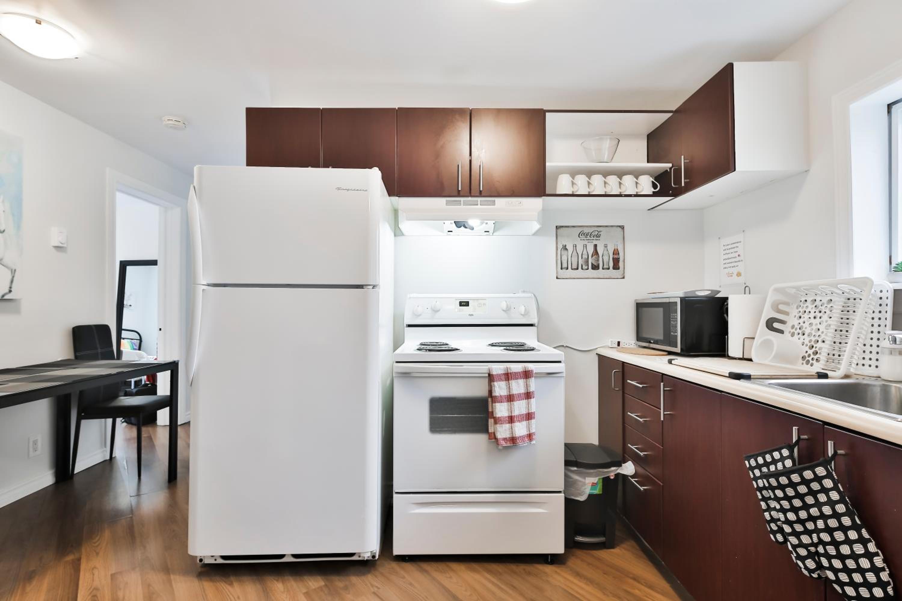 250 METERS to METRO BERRI UQAM - Spacious fully equipped APARTMENTS - 1 FREE PARKING per unit - in-unit Washer & Dryer - fully stocked KITCHEN - WORKSPACE 