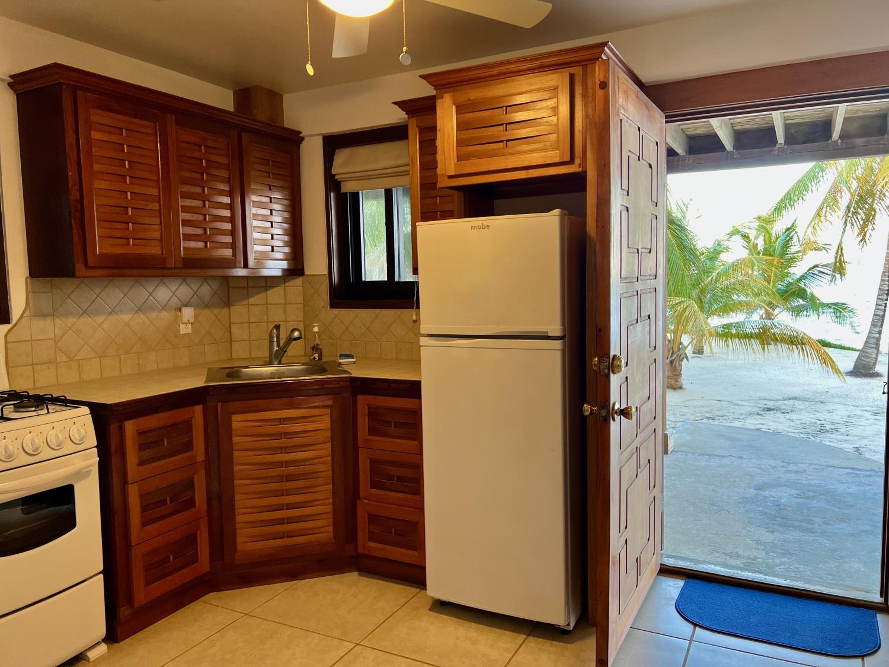 Beachfront Home Kissin' the Caribbean - BELLA SWAY BELIZE
