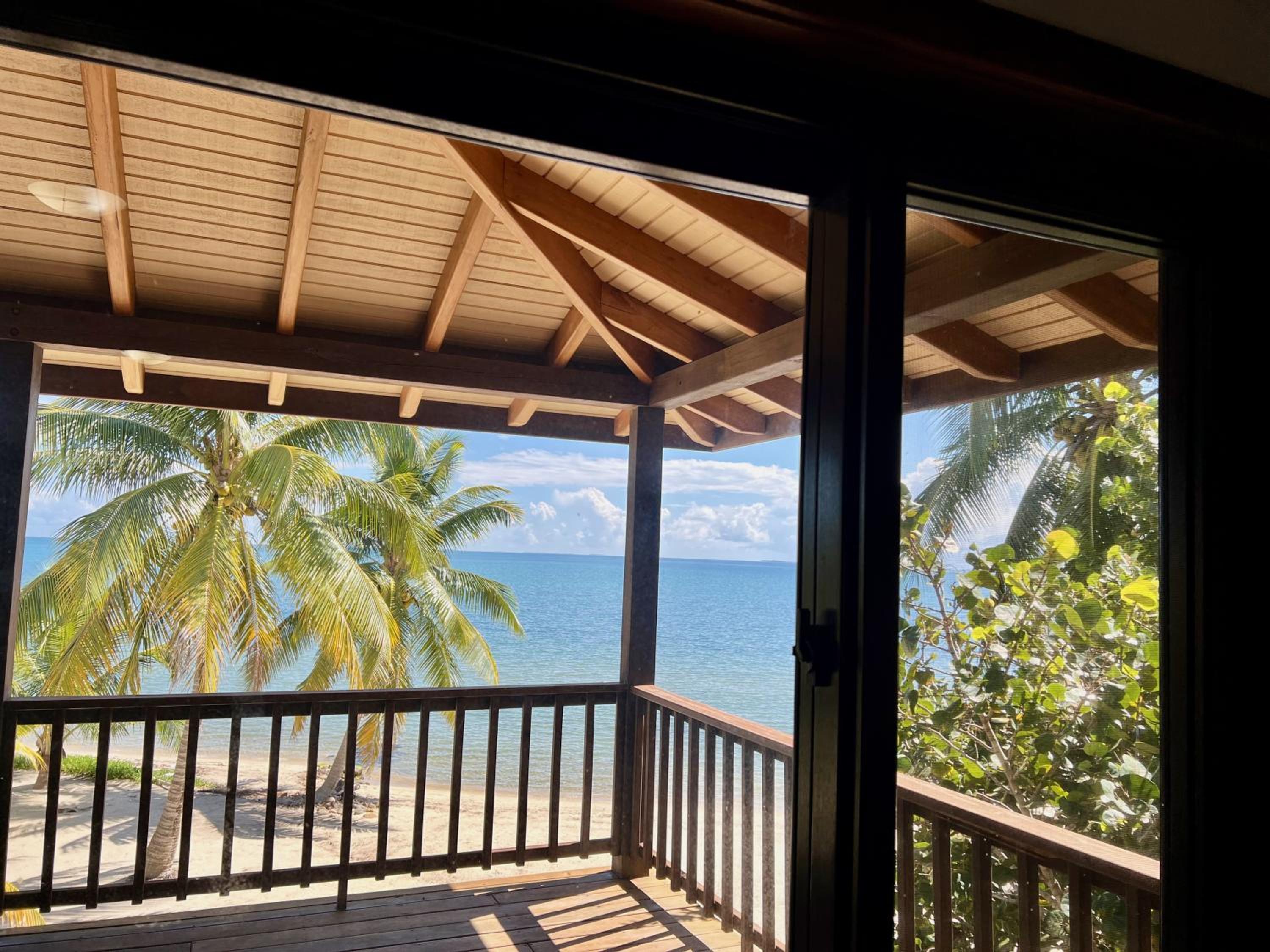 Beachfront Home Kissin' the Caribbean - BELLA SWAY BELIZE
