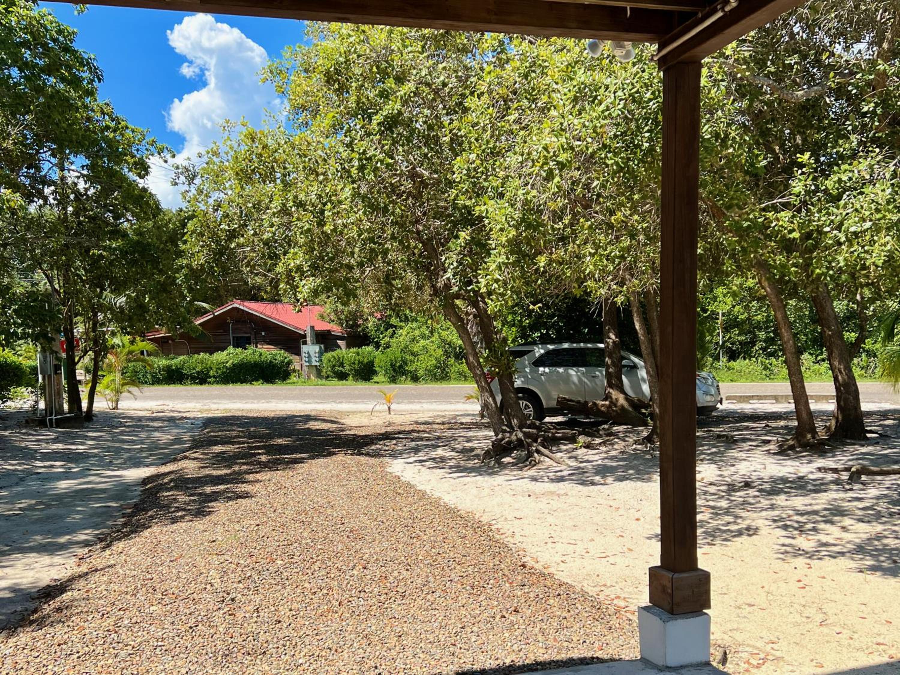 Beachfront Home Kissin' the Caribbean - BELLA SWAY BELIZE